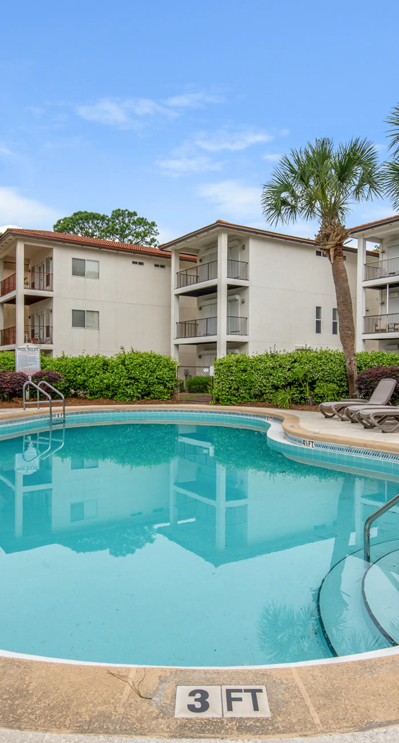 Three-level home with two kitchens, two decks, lanai, pool & ocean view