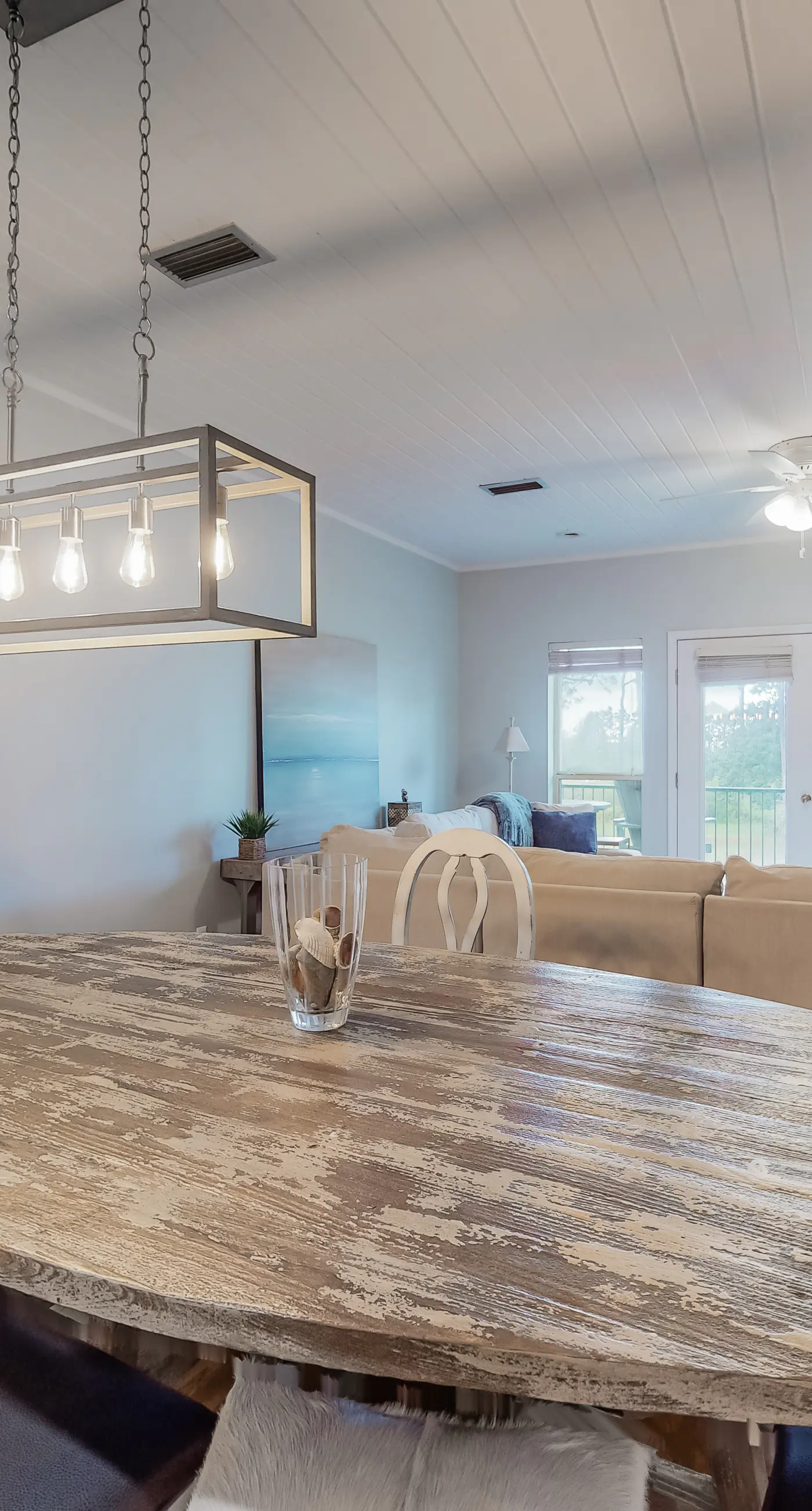 Three-level home with two kitchens, two decks, lanai, pool & ocean view