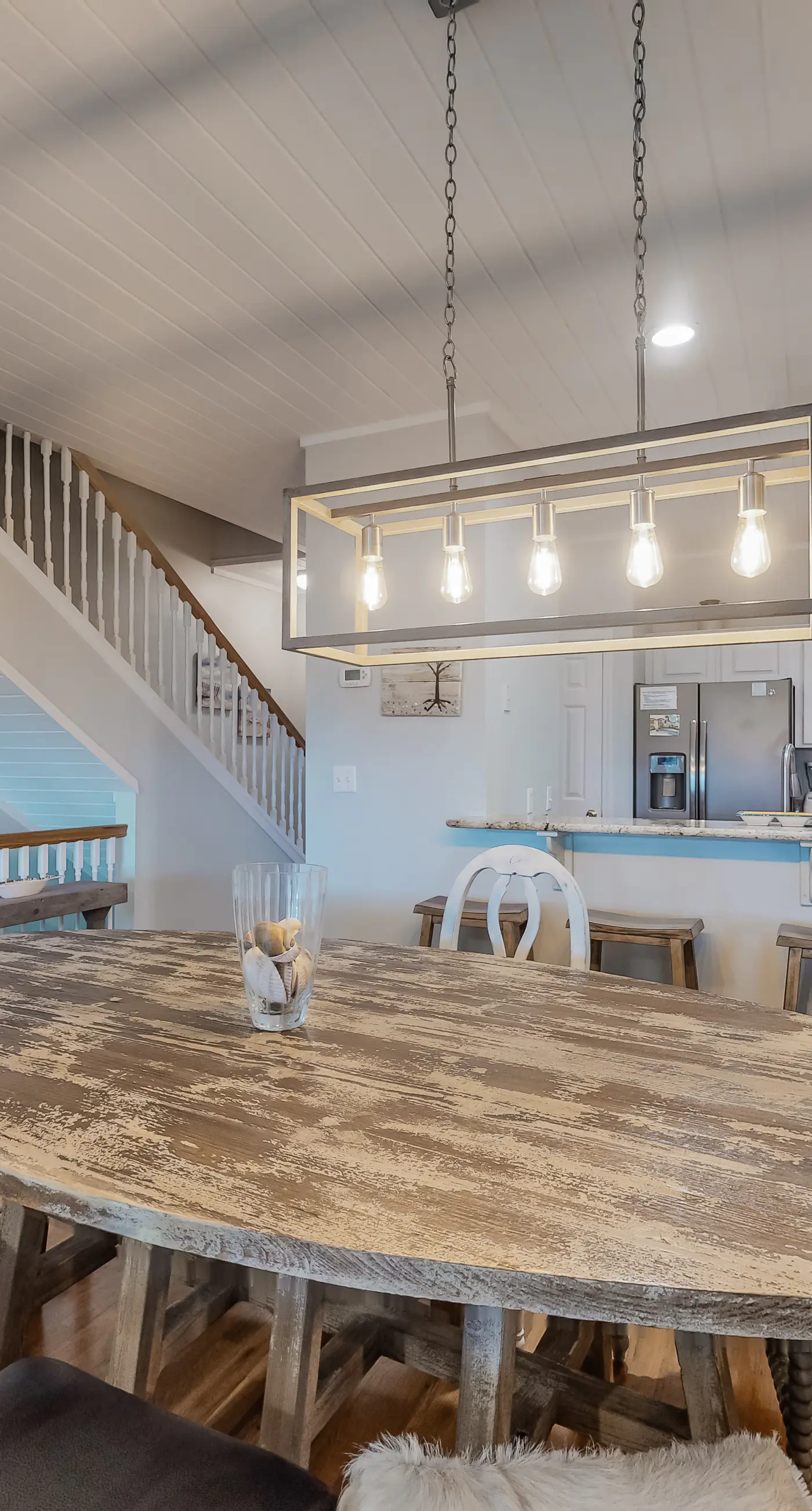 Three-level home with two kitchens, two decks, lanai, pool & ocean view