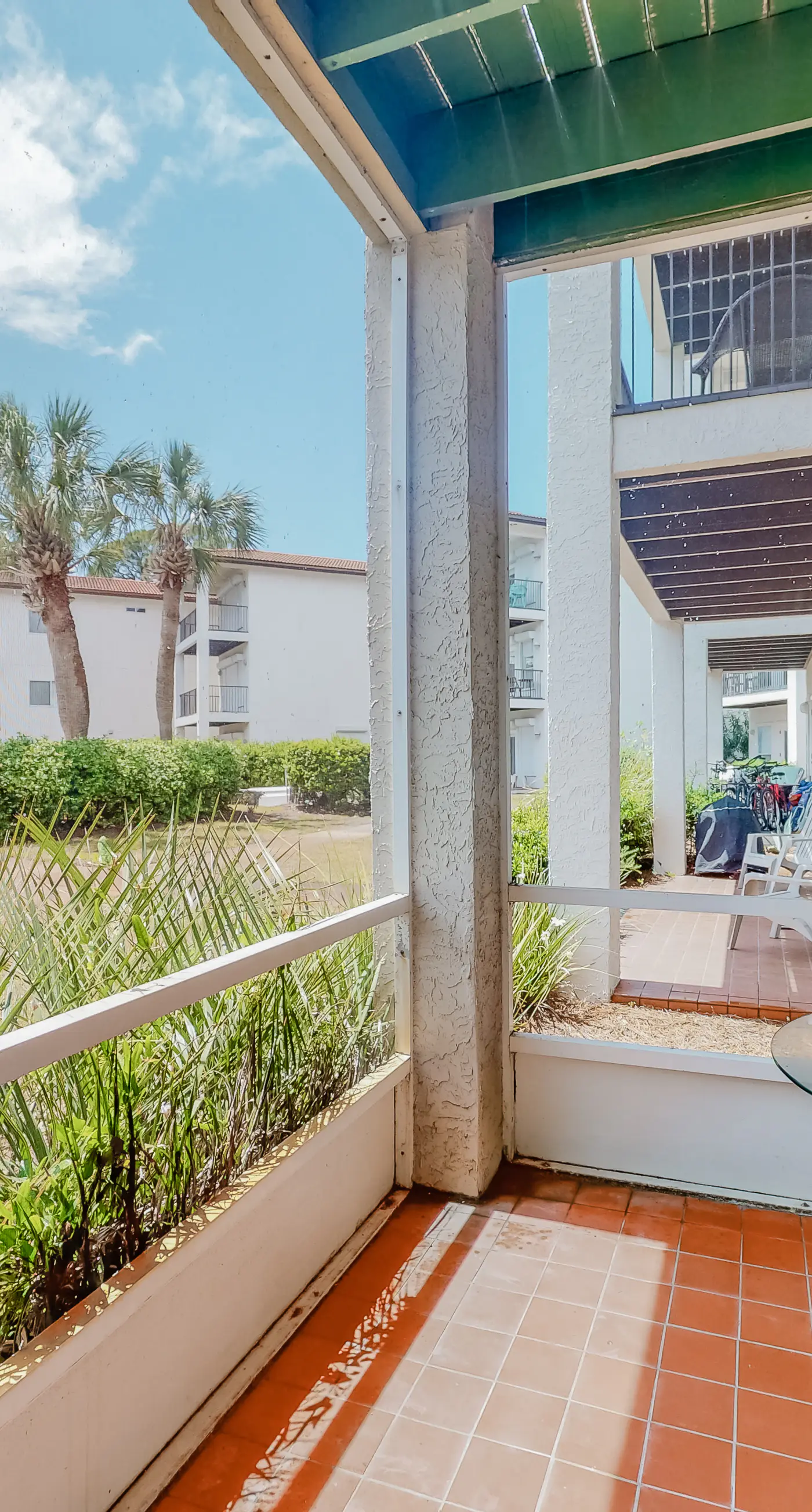 Three-level home with two kitchens, two decks, lanai, pool & ocean view