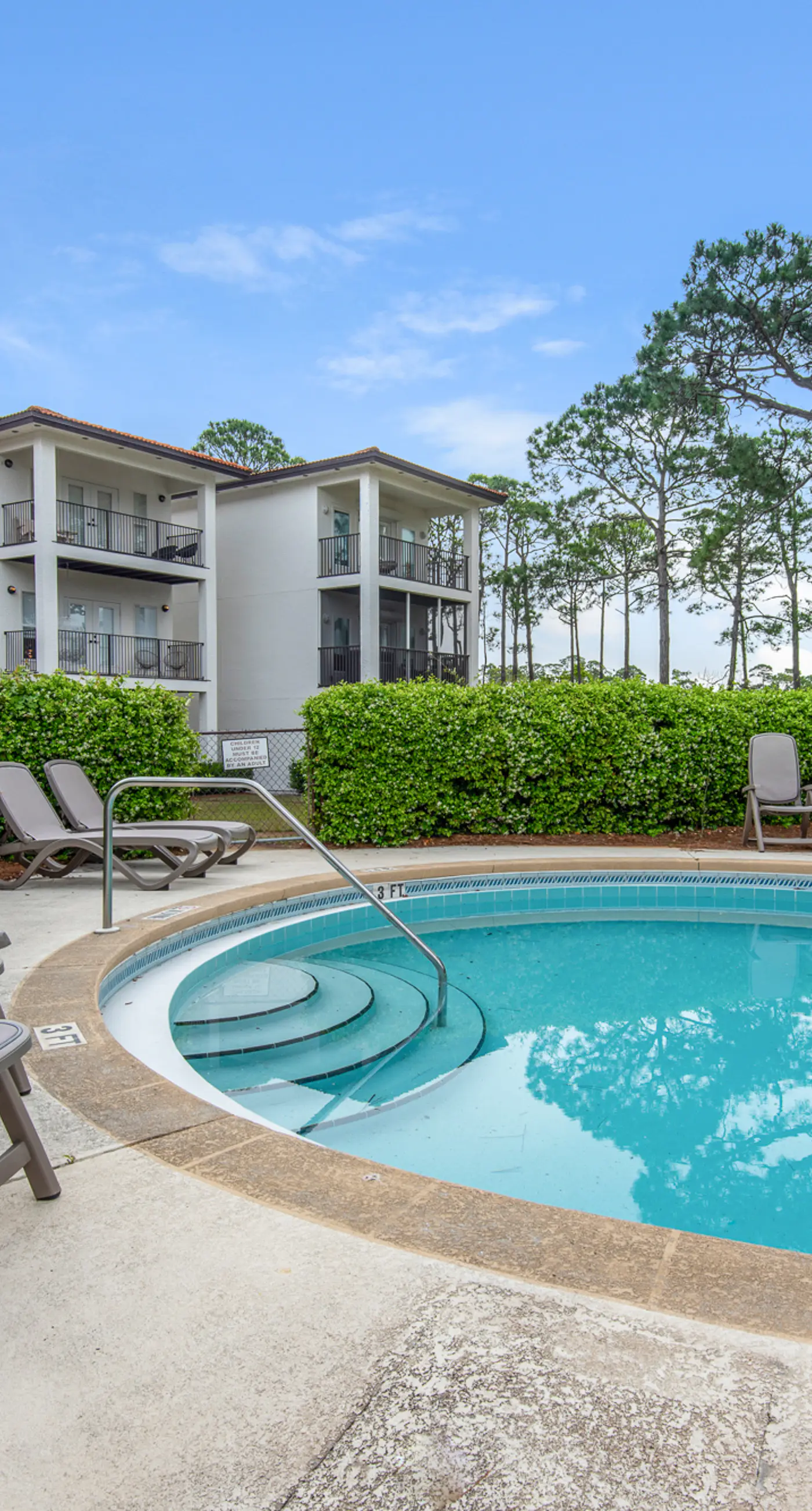 Three-level home with two kitchens, two decks, lanai, pool & ocean view