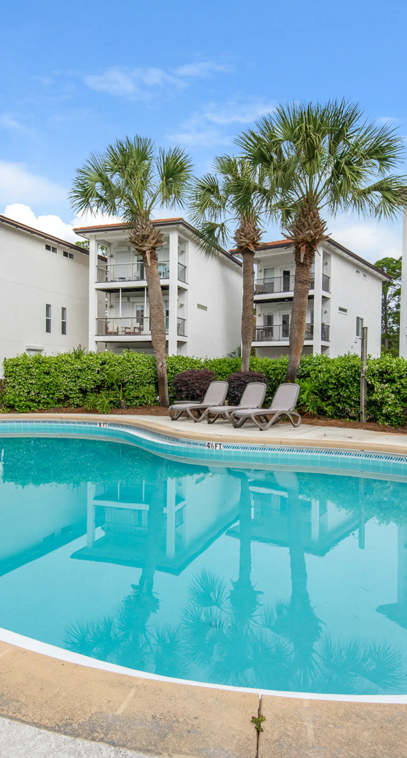Three-level home with two kitchens, two decks, lanai, pool & ocean view