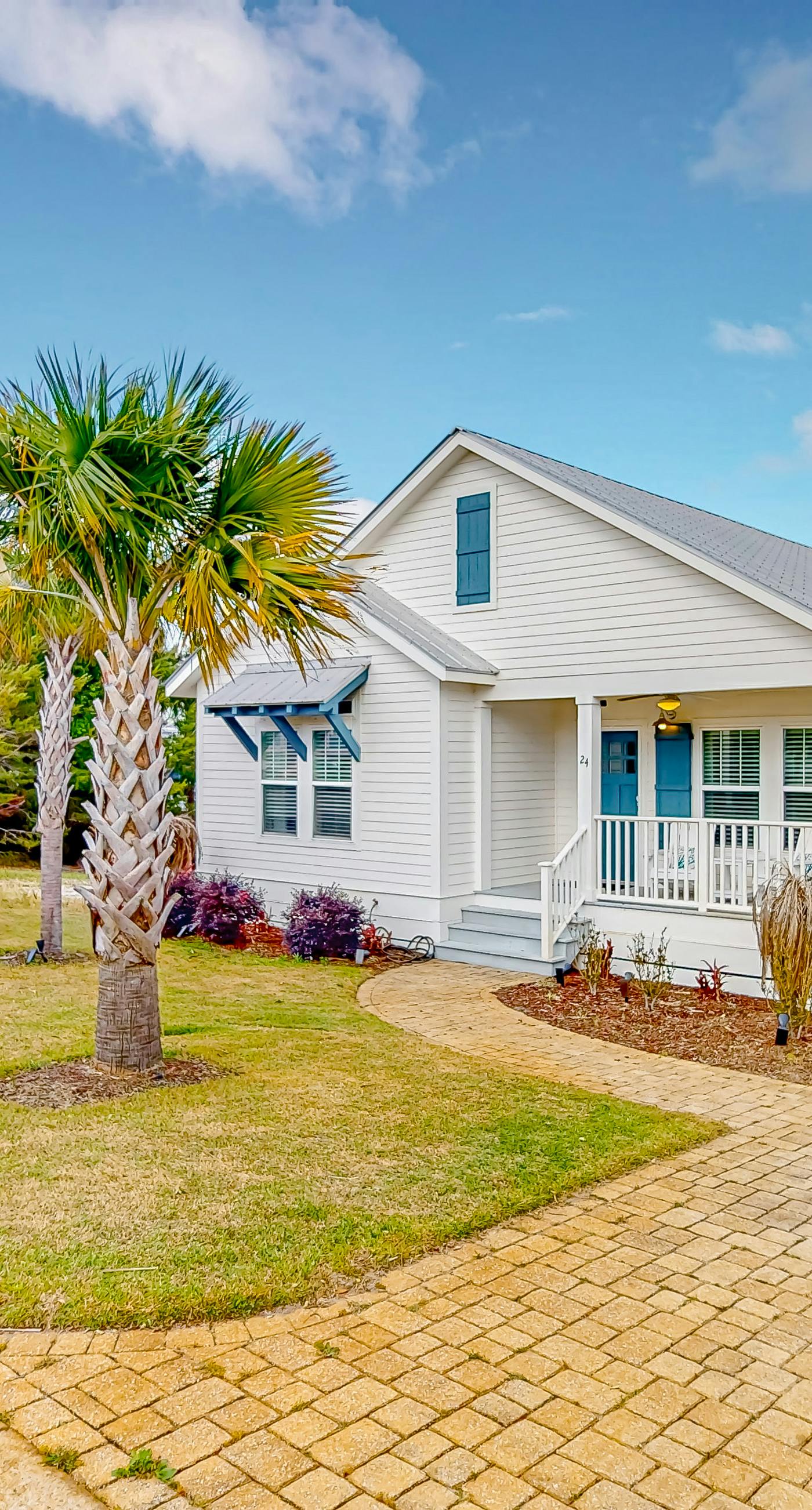 Charming home with enclosed sunroom, porch, central AC, & W&D - near beach