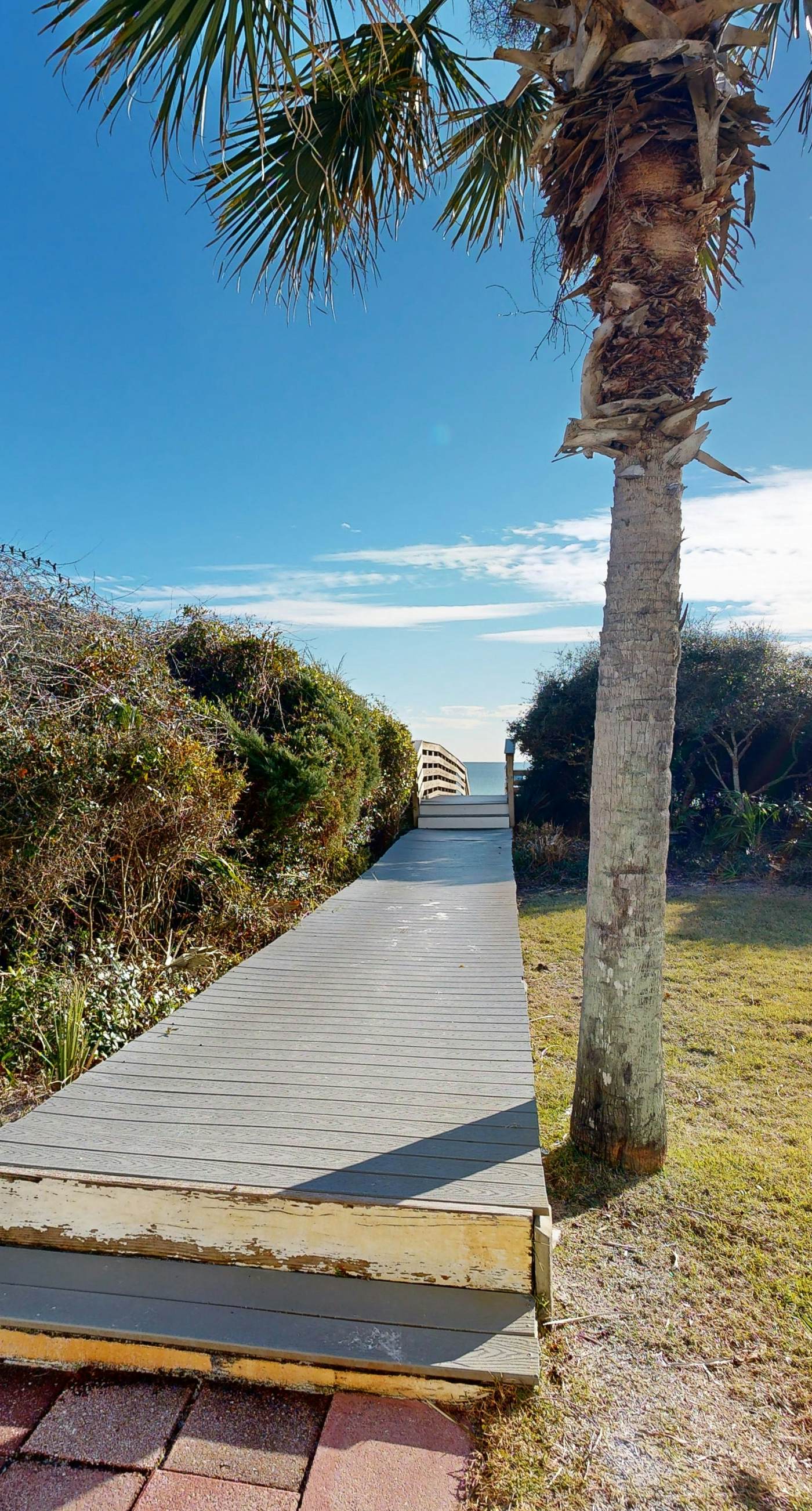 Courtyard view condo with private beach access, private balcony, & free WiFi