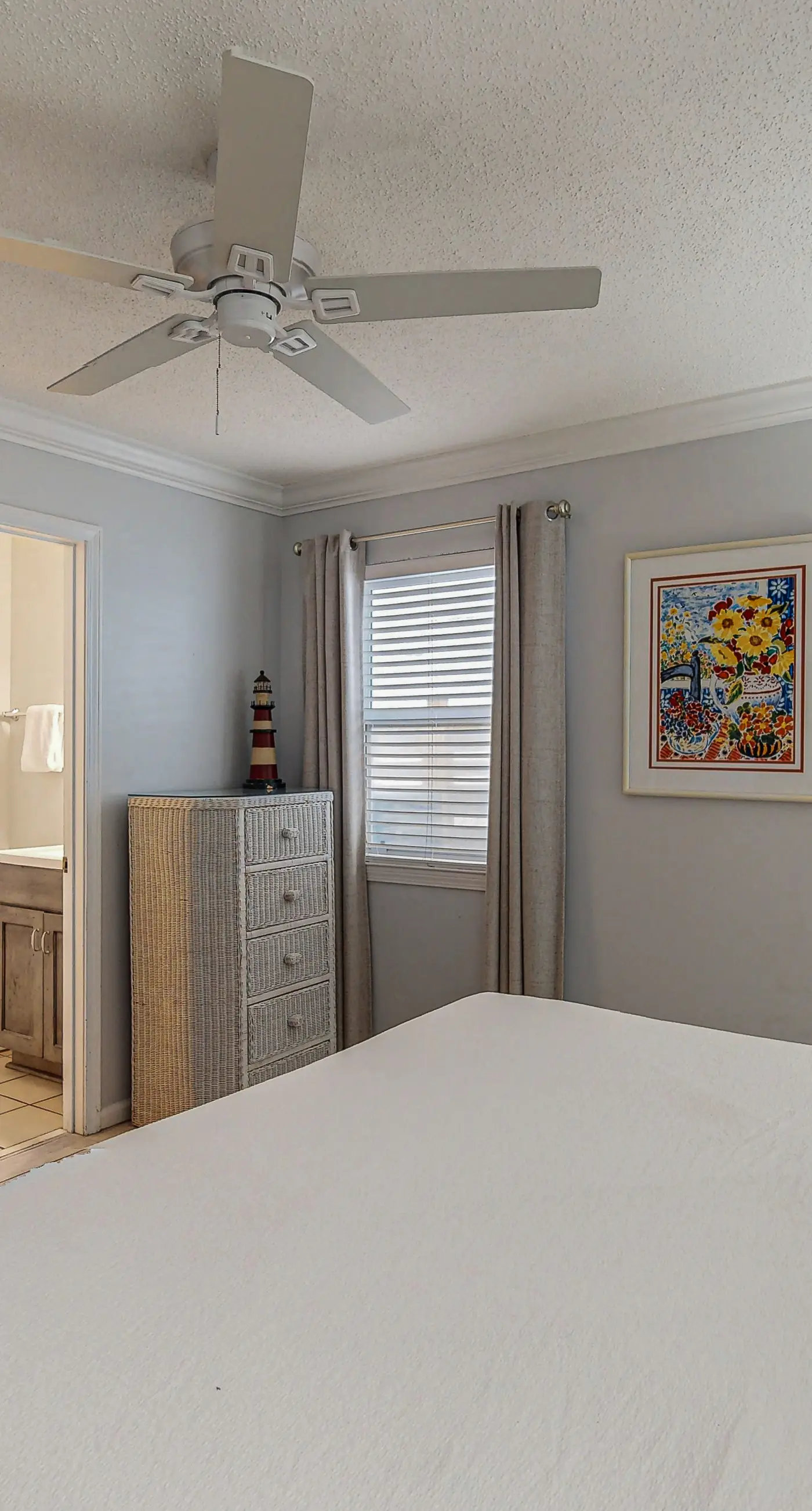 Lovely first floor condo with ocean views, patio, & grill - steps from the beach