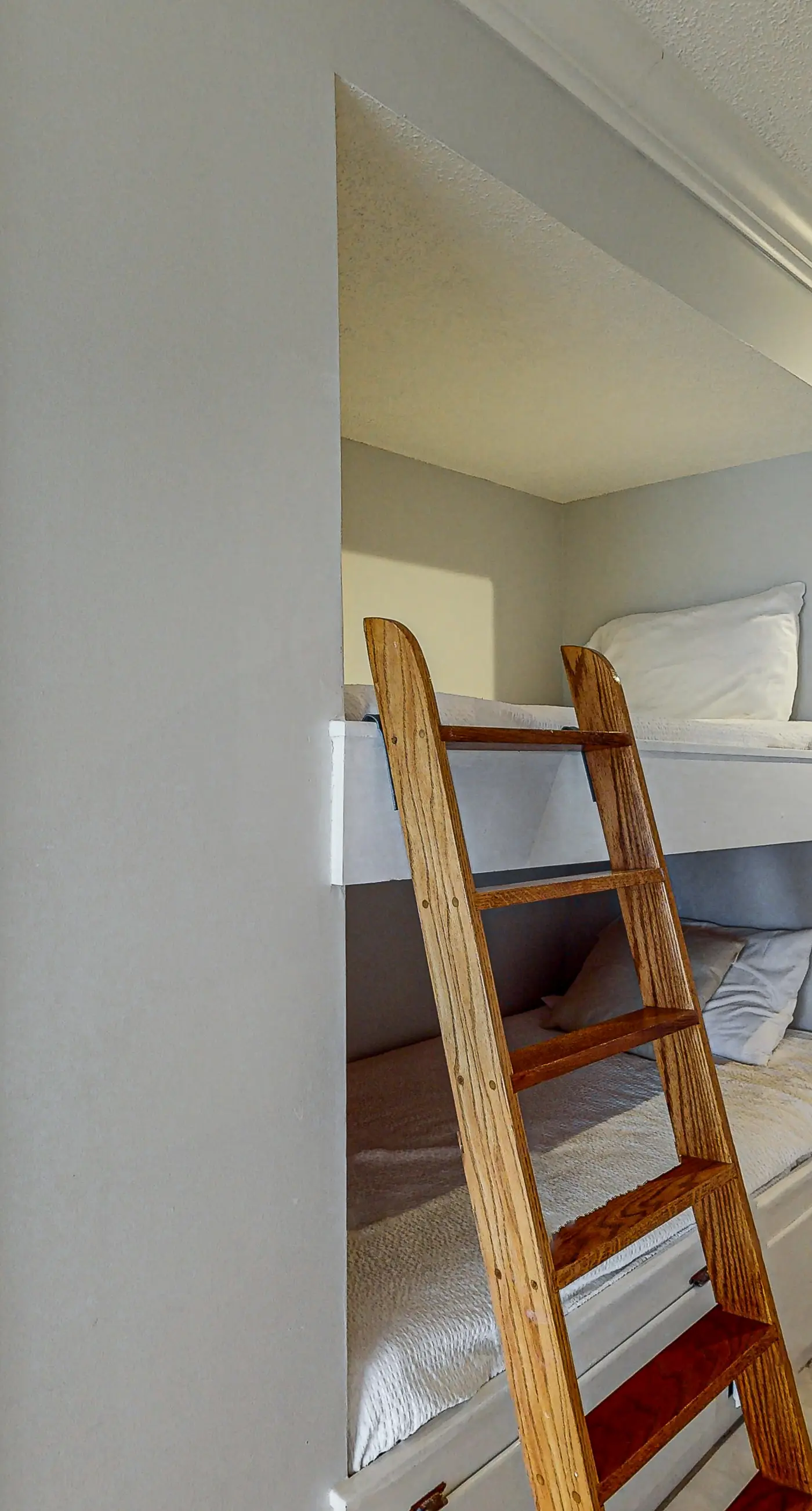 Lovely first floor condo with ocean views, patio, & grill - steps from the beach