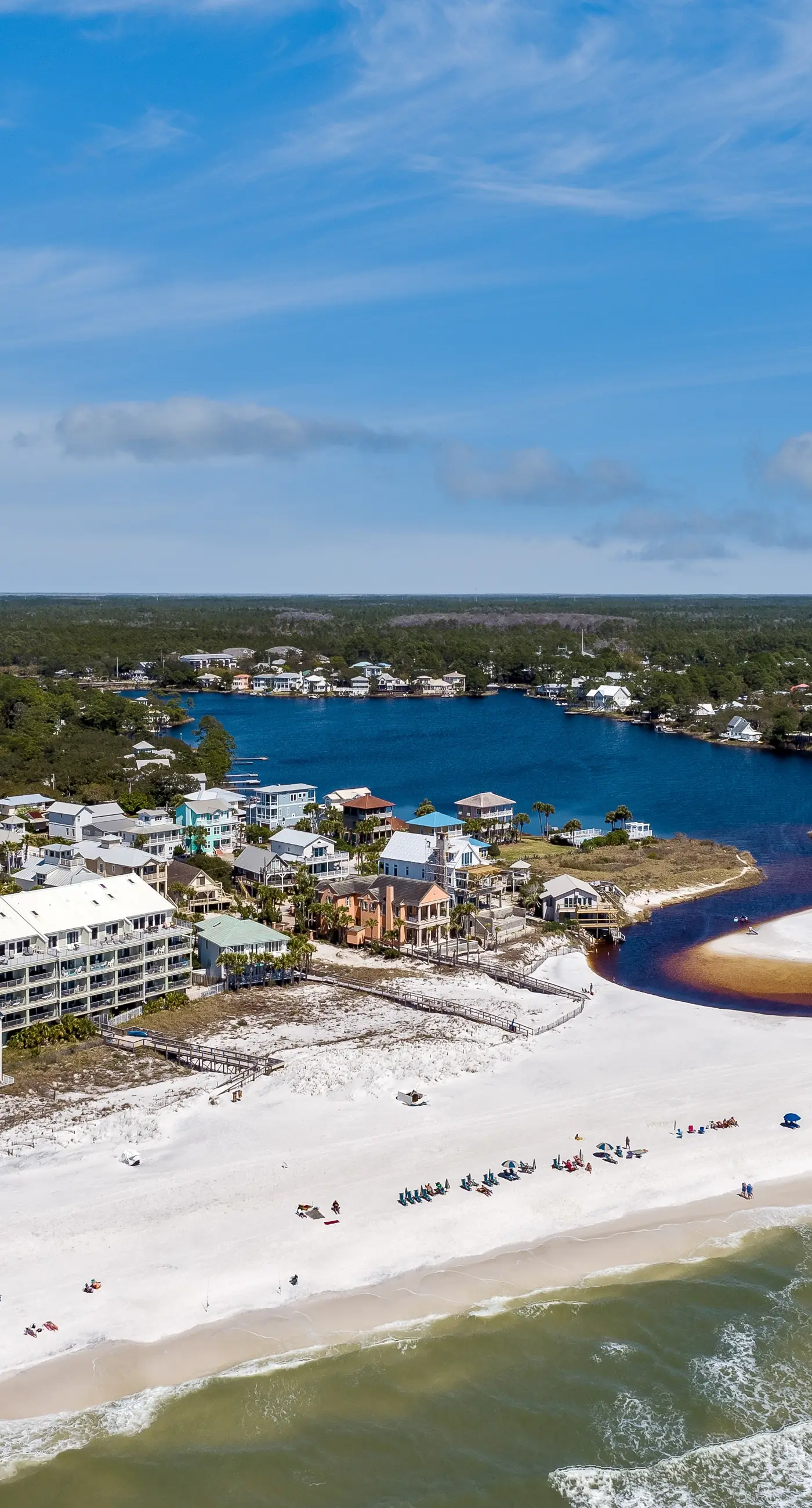 Lovely first floor condo with ocean views, patio, & grill - steps from the beach