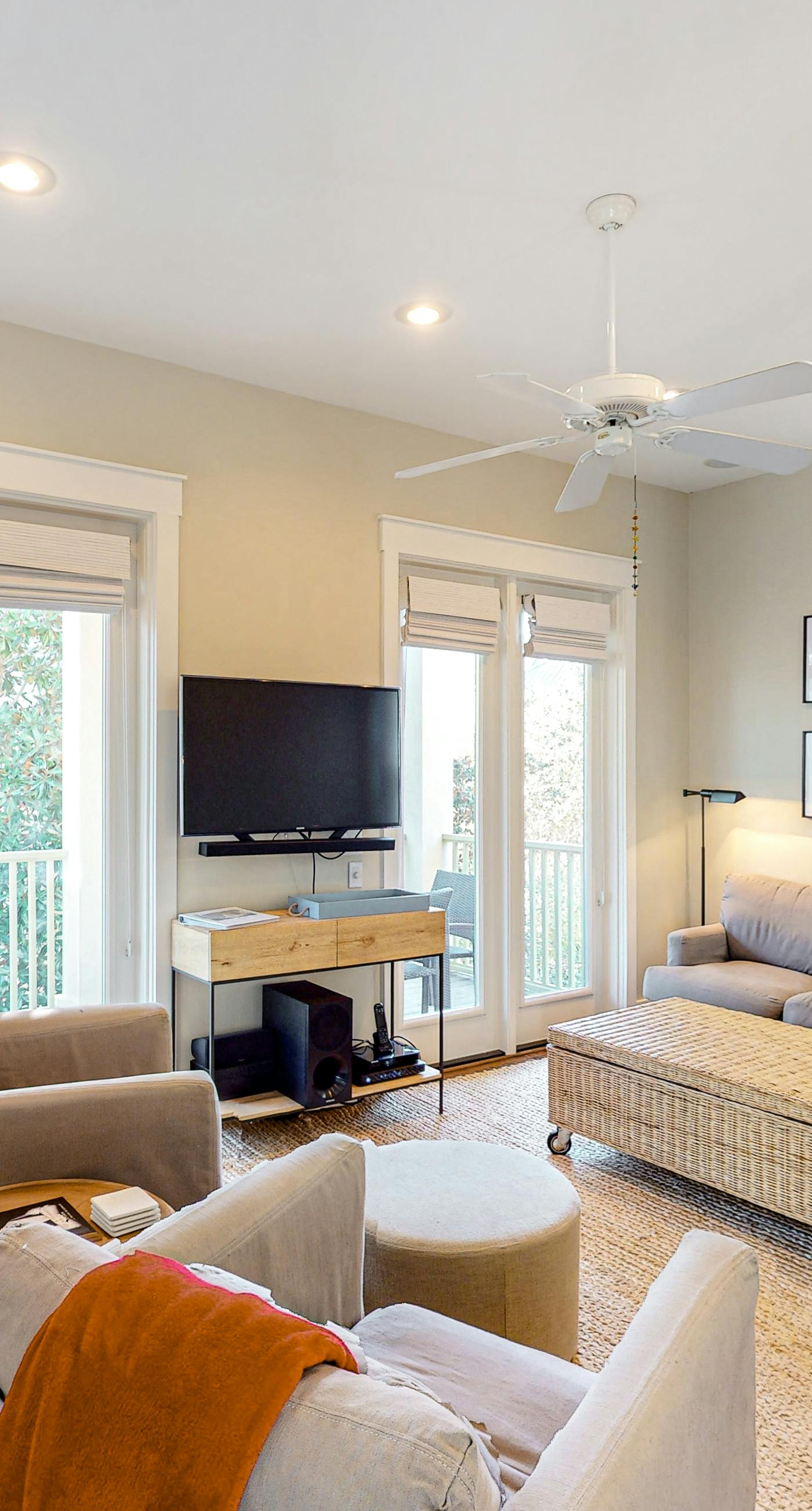 Modern coastal retreat with 2 balconies, grill, central AC, shared Pools, & WiFi