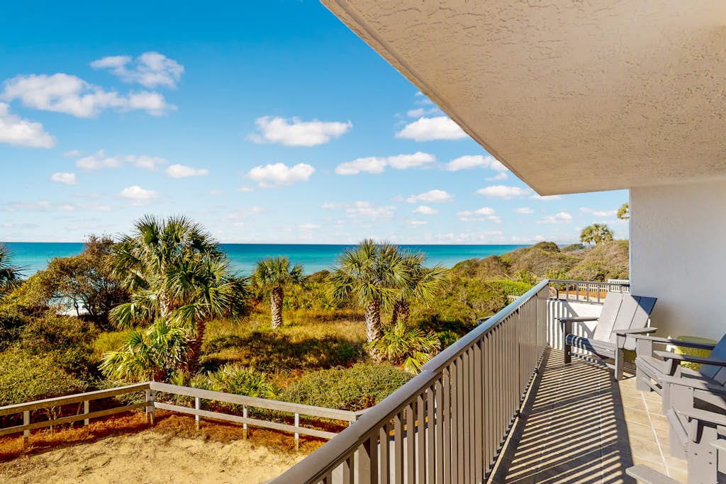 Second floor oceanfront condo with pool access, ocean view, WiFi, W/D, and AC