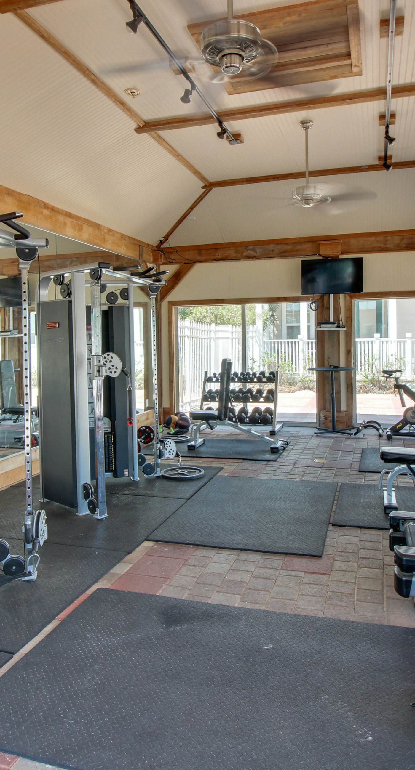 Cozy coastal condo with shared pool, central AC & free WiFi