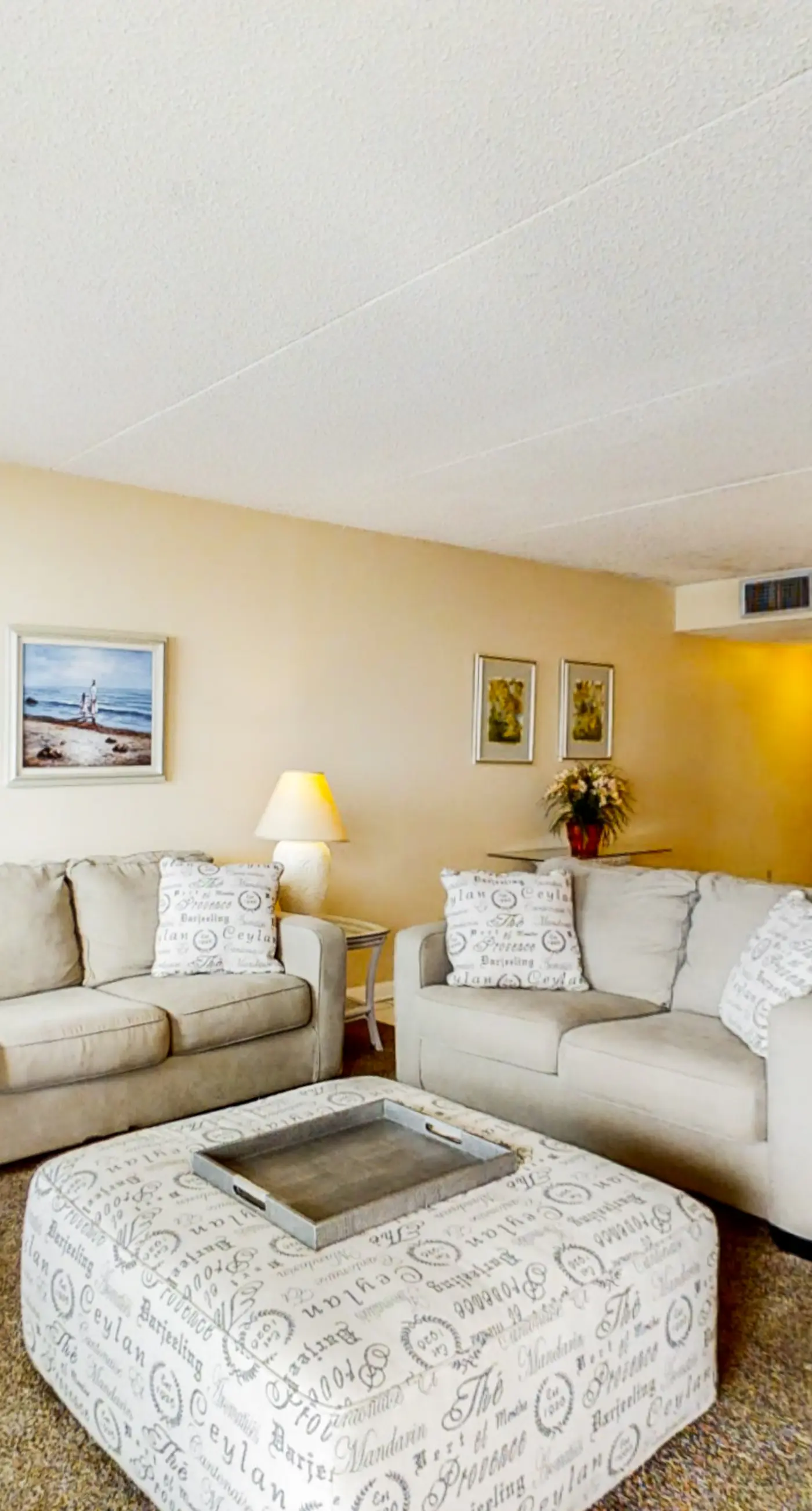 Updated beachfront condo with beach setup - quick drive to entertainment!