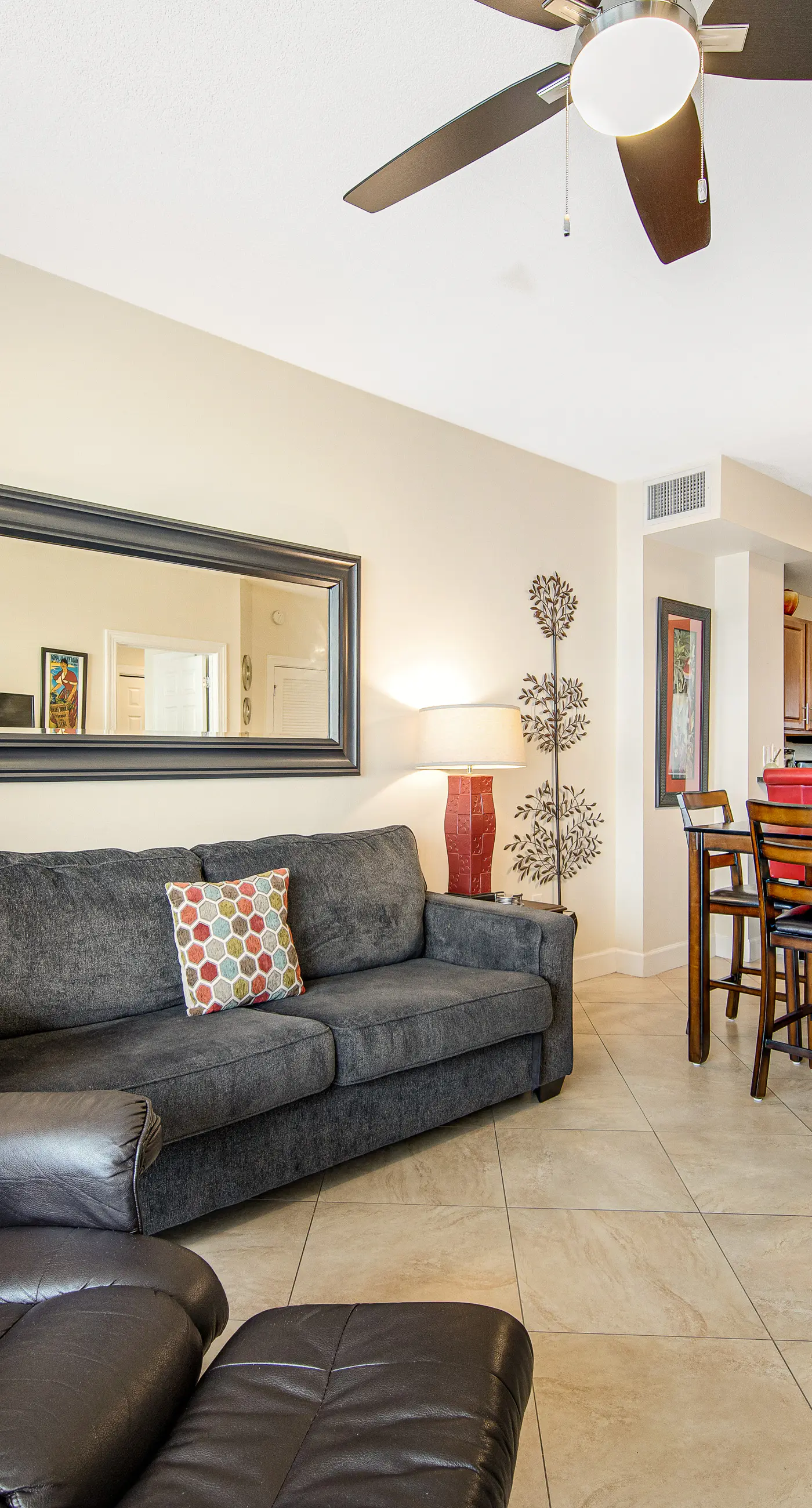 Inviting & spacious 18th-floor condo with tropical pools & gym - walk to the beach