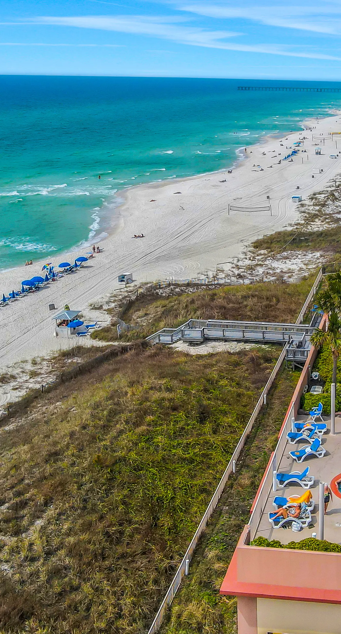 Inviting & spacious 18th-floor condo with tropical pools & gym - walk to the beach