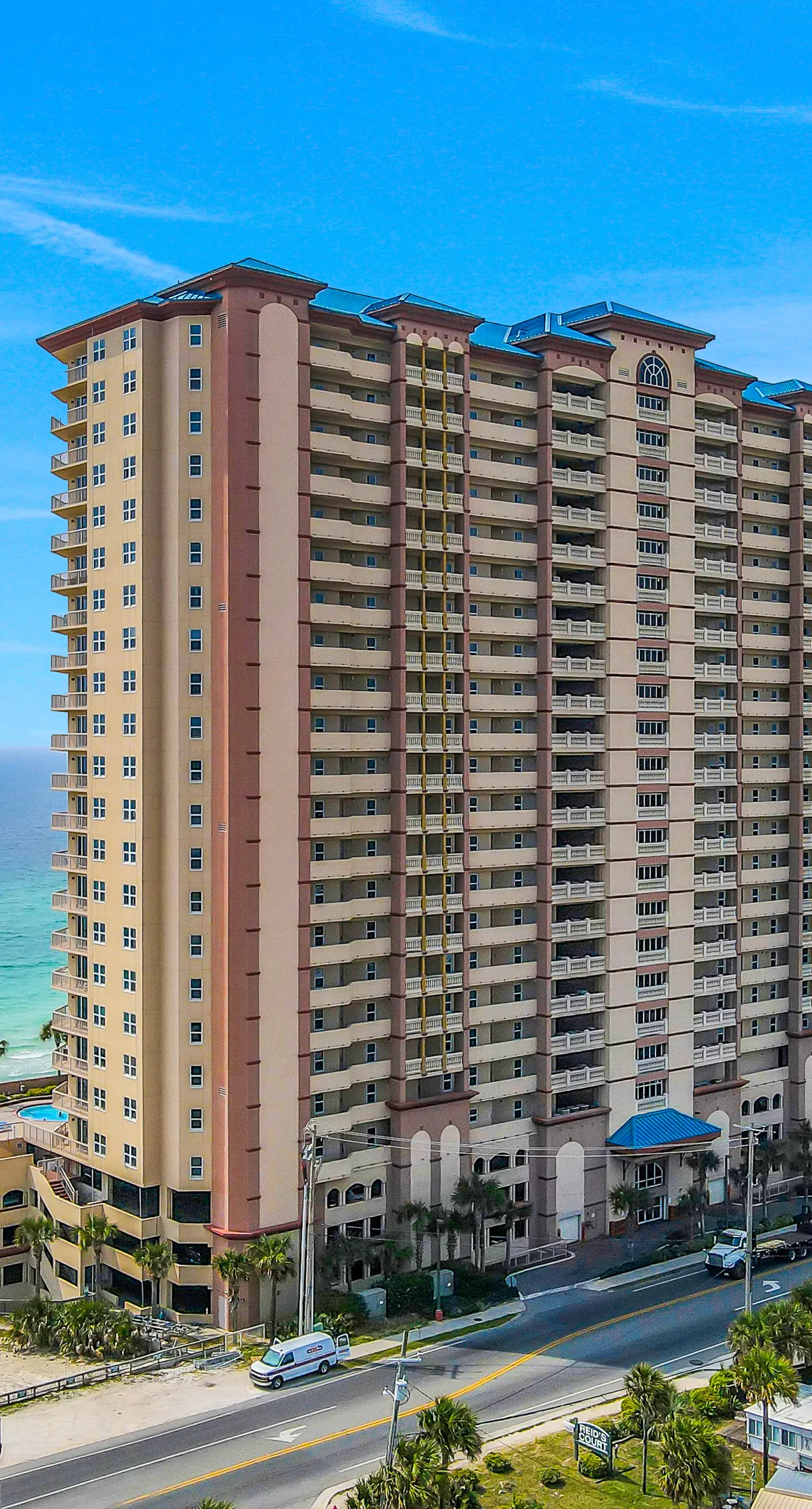 Inviting & spacious 18th-floor condo with tropical pools & gym - walk to the beach