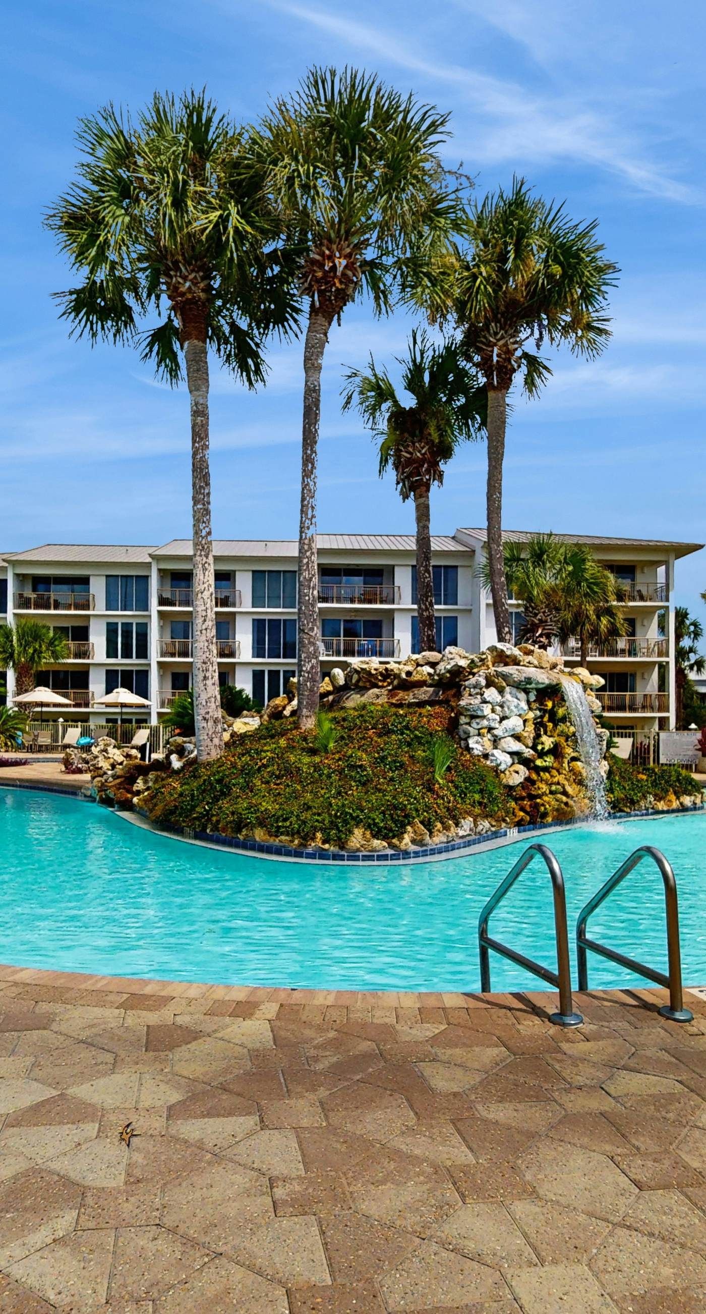 Elegant abode overlooking the pool with beach access, tennis & pickleball