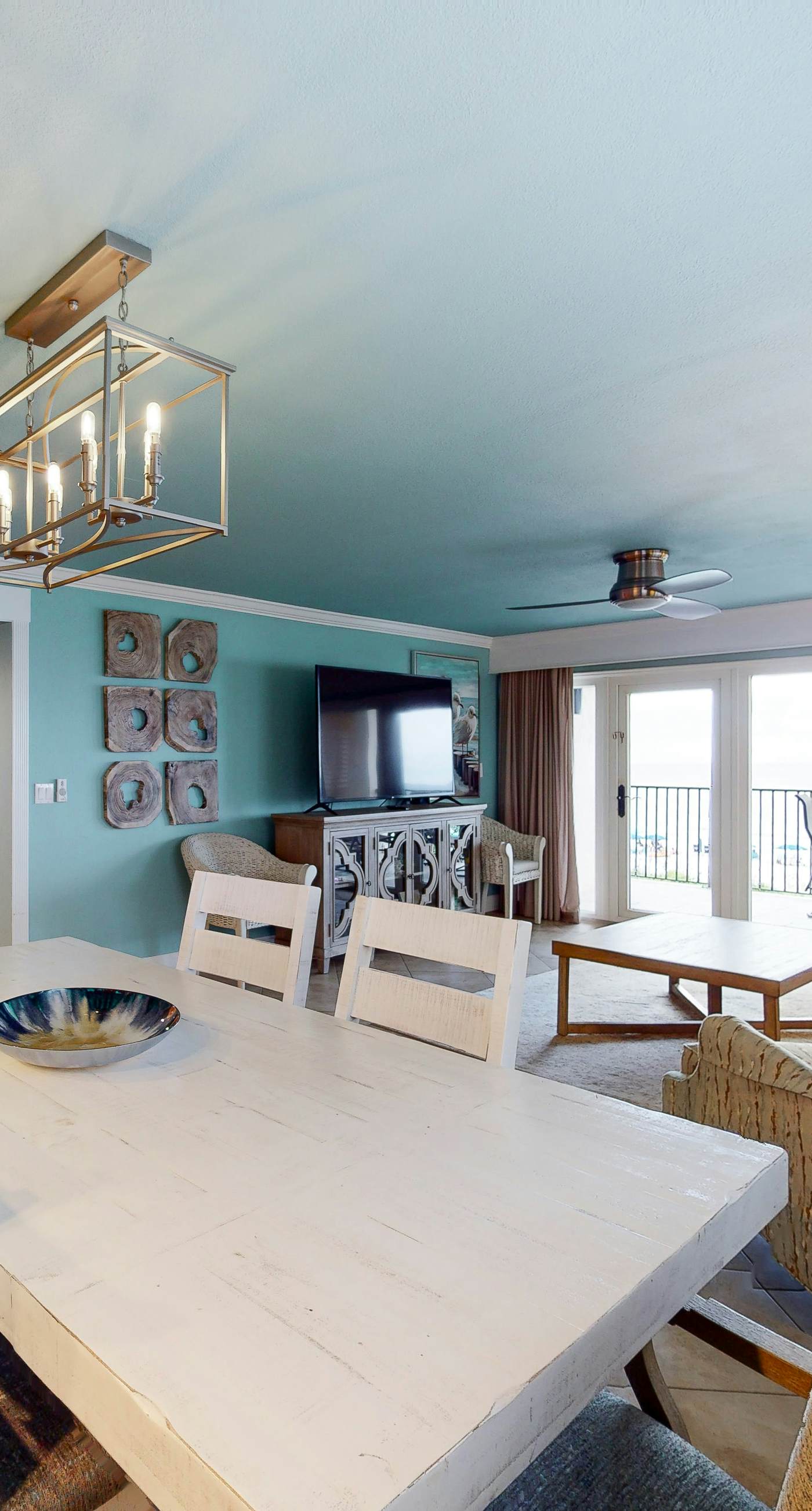 Gorgeous beachfront condo with a pool & private beach access