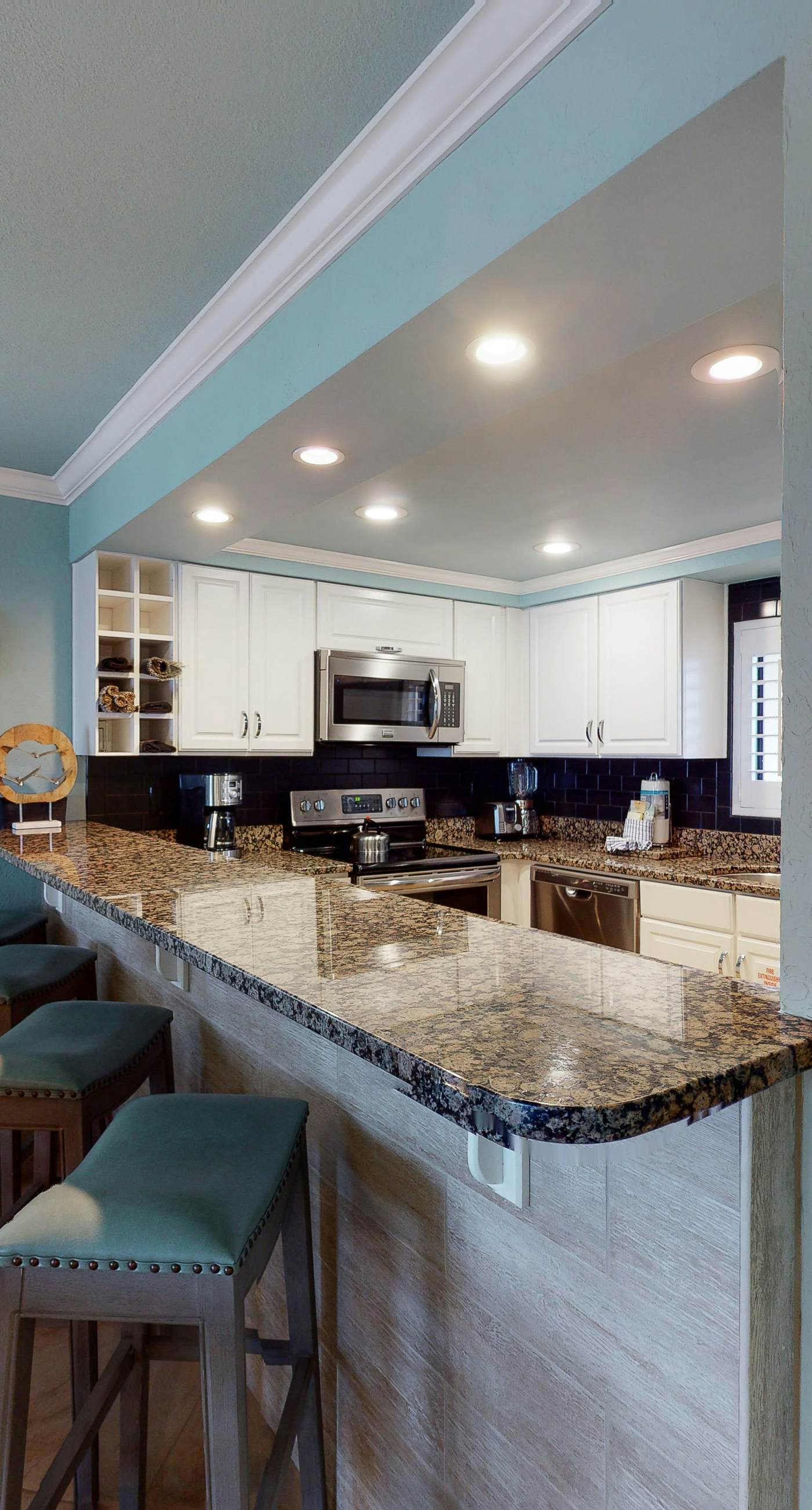 Gorgeous beachfront condo with a pool & private beach access