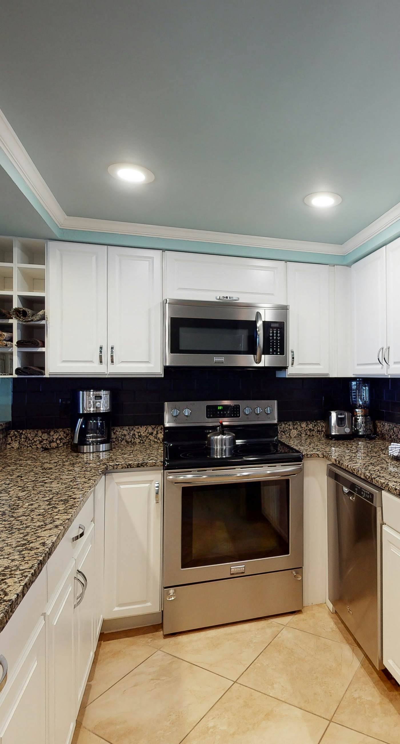 Gorgeous beachfront condo with a pool & private beach access