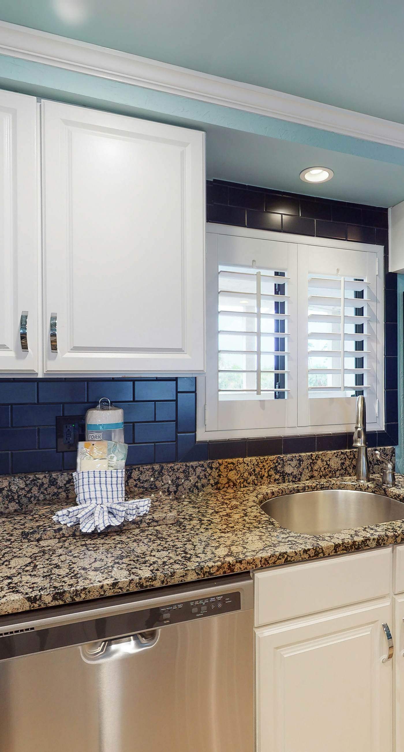 Gorgeous beachfront condo with a pool & private beach access