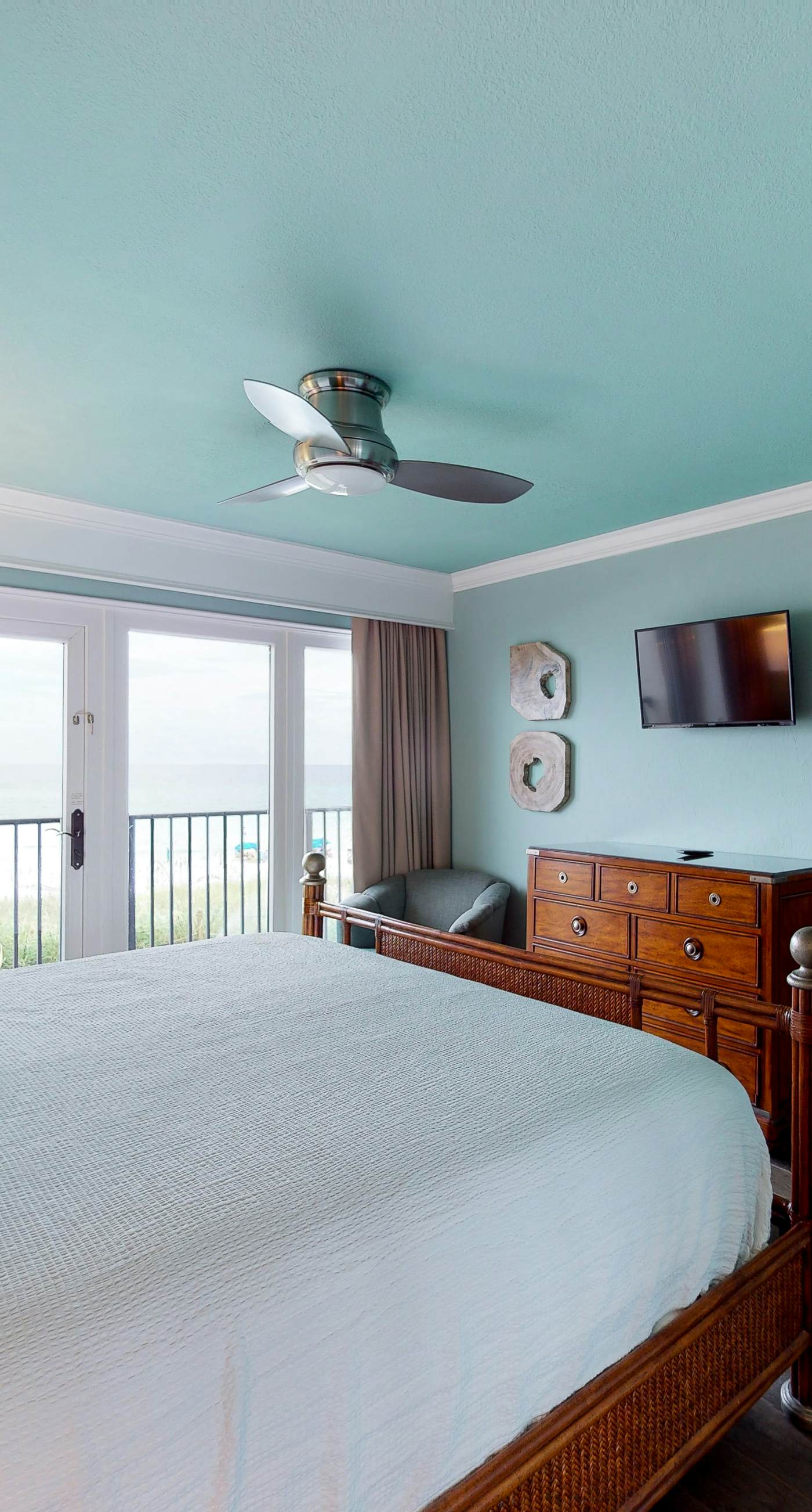 Gorgeous beachfront condo with a pool & private beach access