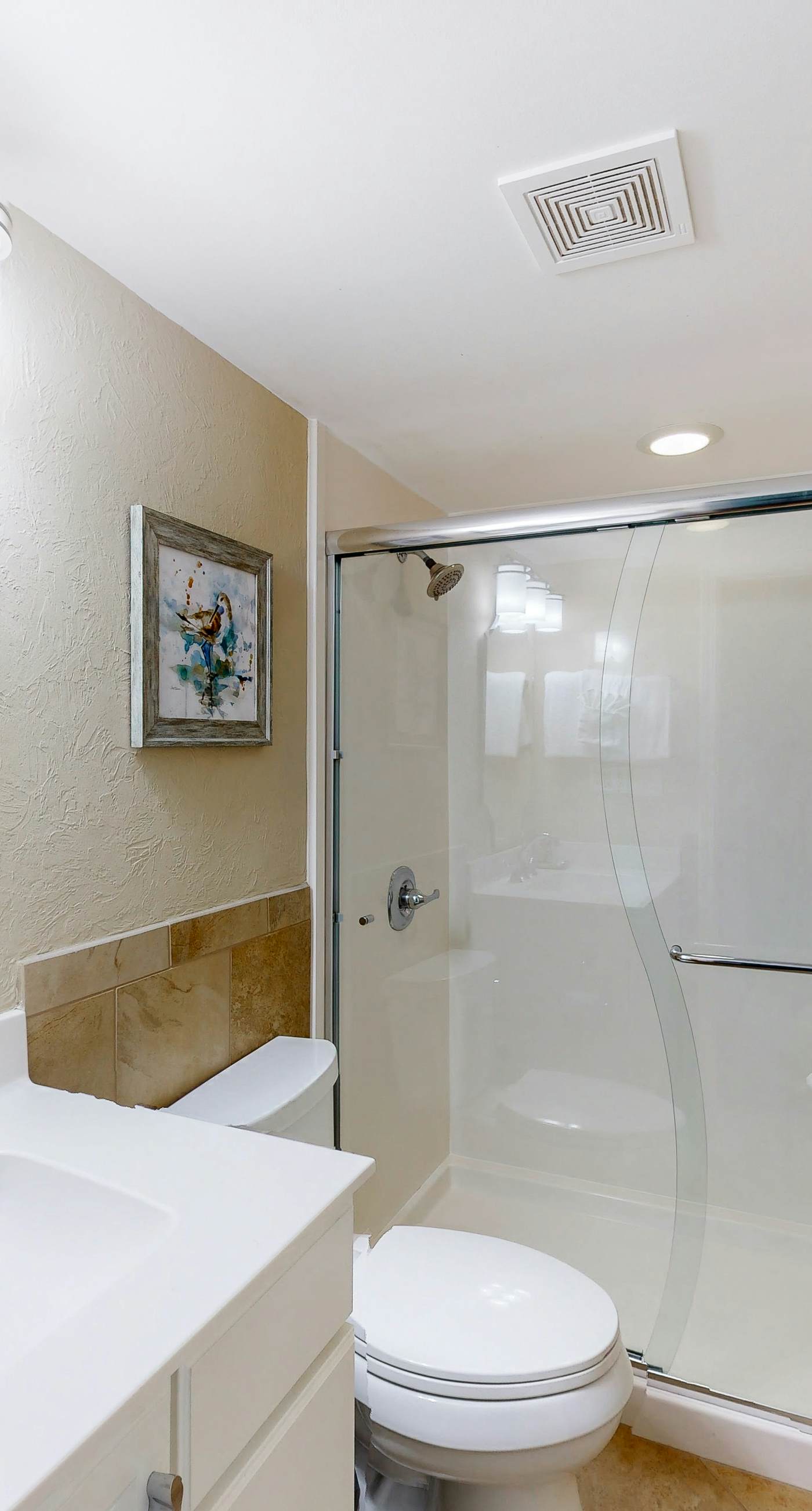 Gorgeous beachfront condo with a pool & private beach access