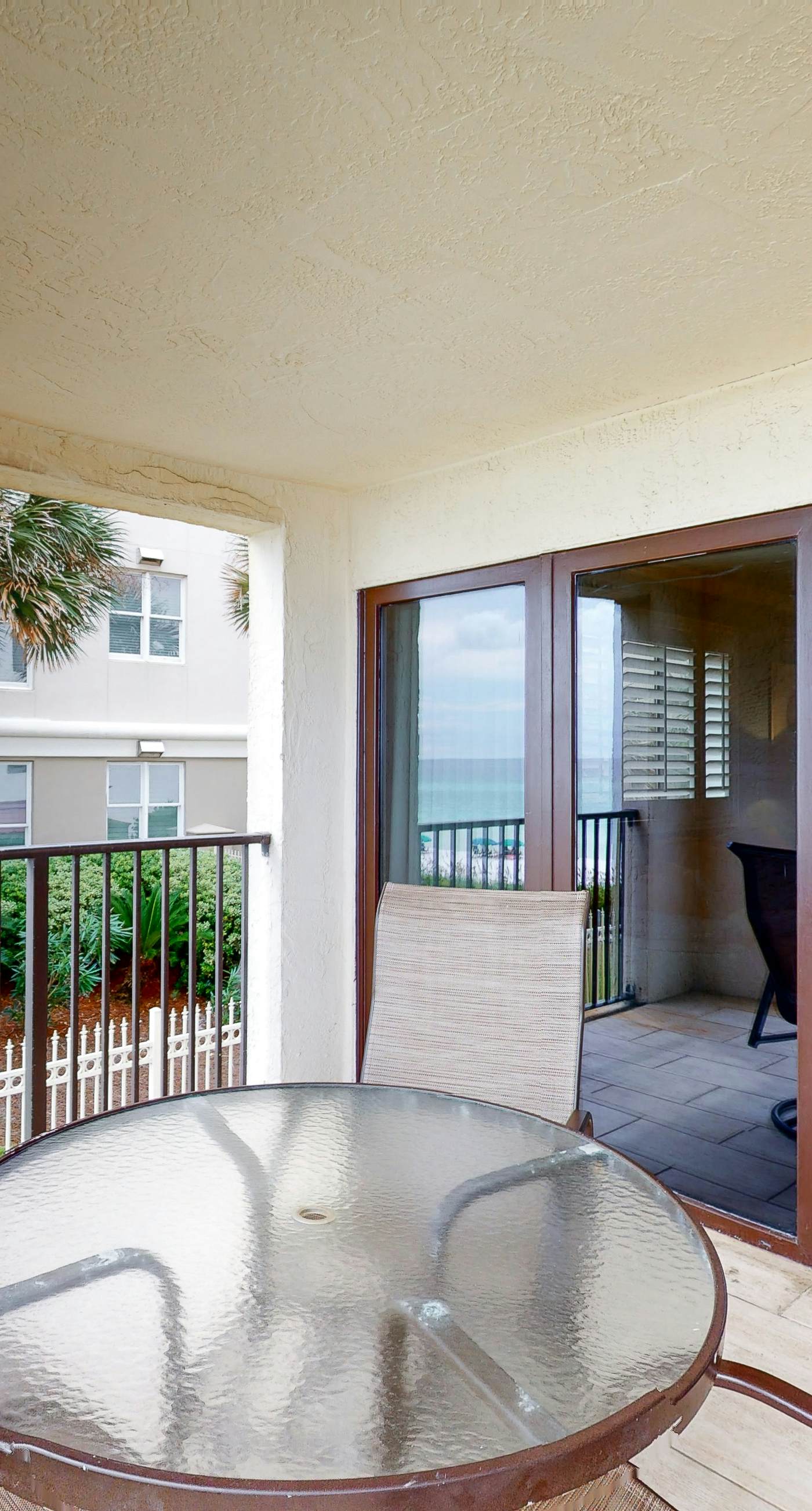 Gorgeous beachfront condo with a pool & private beach access