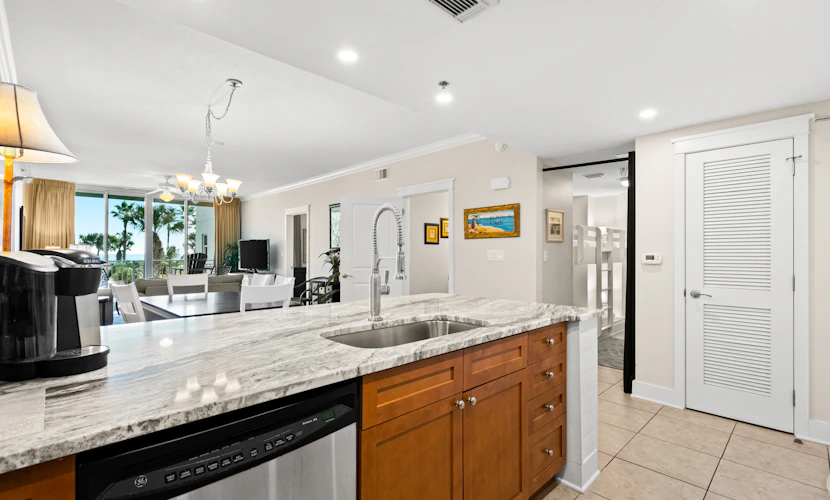 Second floor bright & Spacious condo with resort amenities, ocean views, & W/D