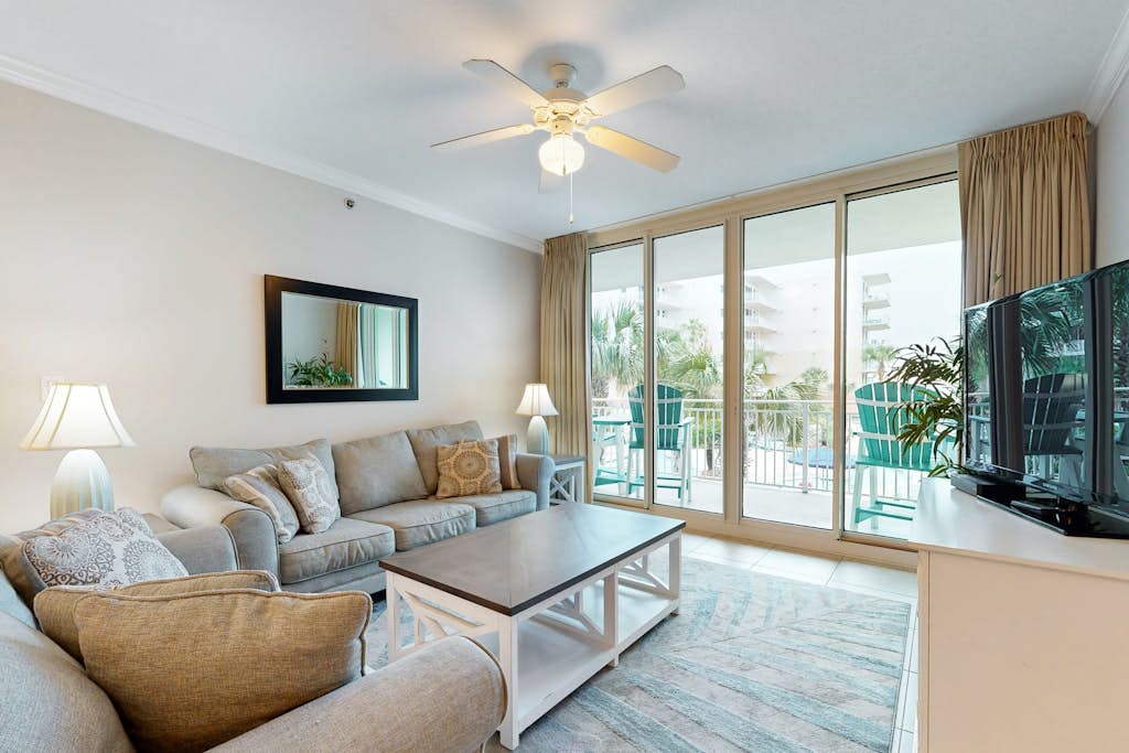 Second floor bright & Spacious condo with resort amenities, ocean views, & W/D