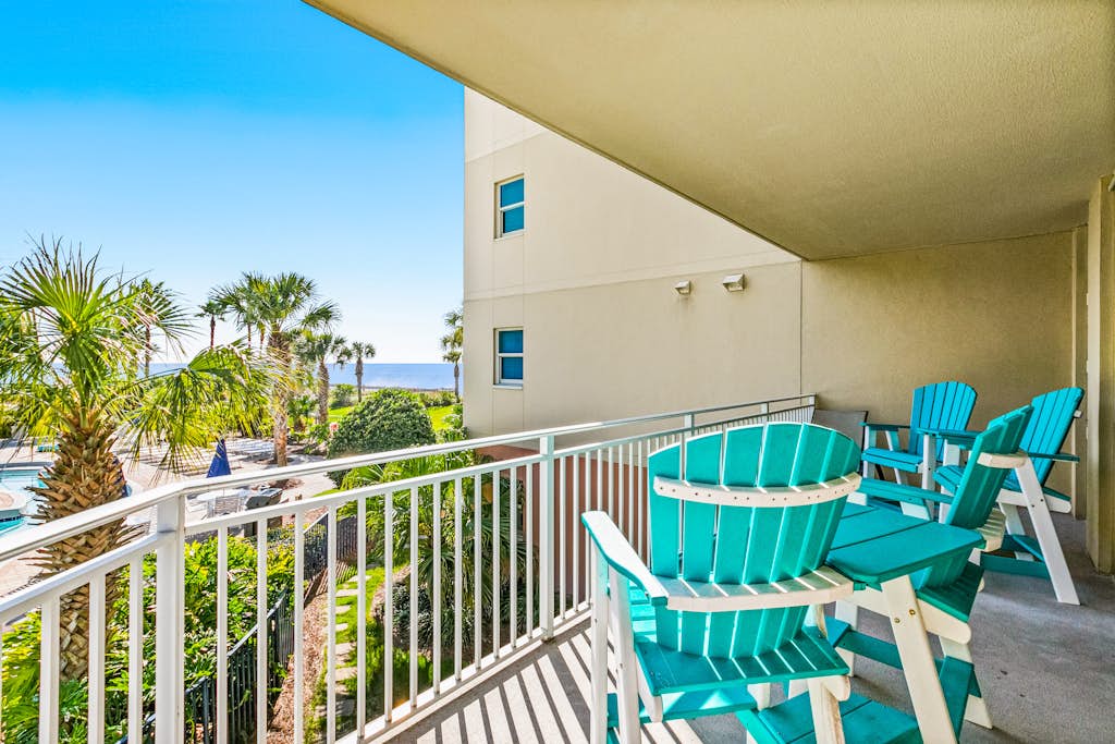 Second floor bright & Spacious condo with resort amenities, ocean views, & W/D