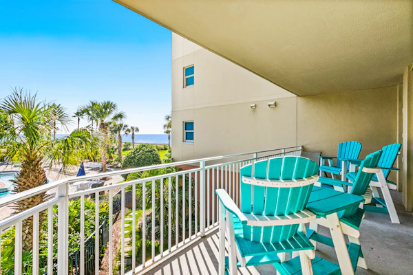 Second floor bright & Spacious condo with resort amenities, ocean views, & W/D