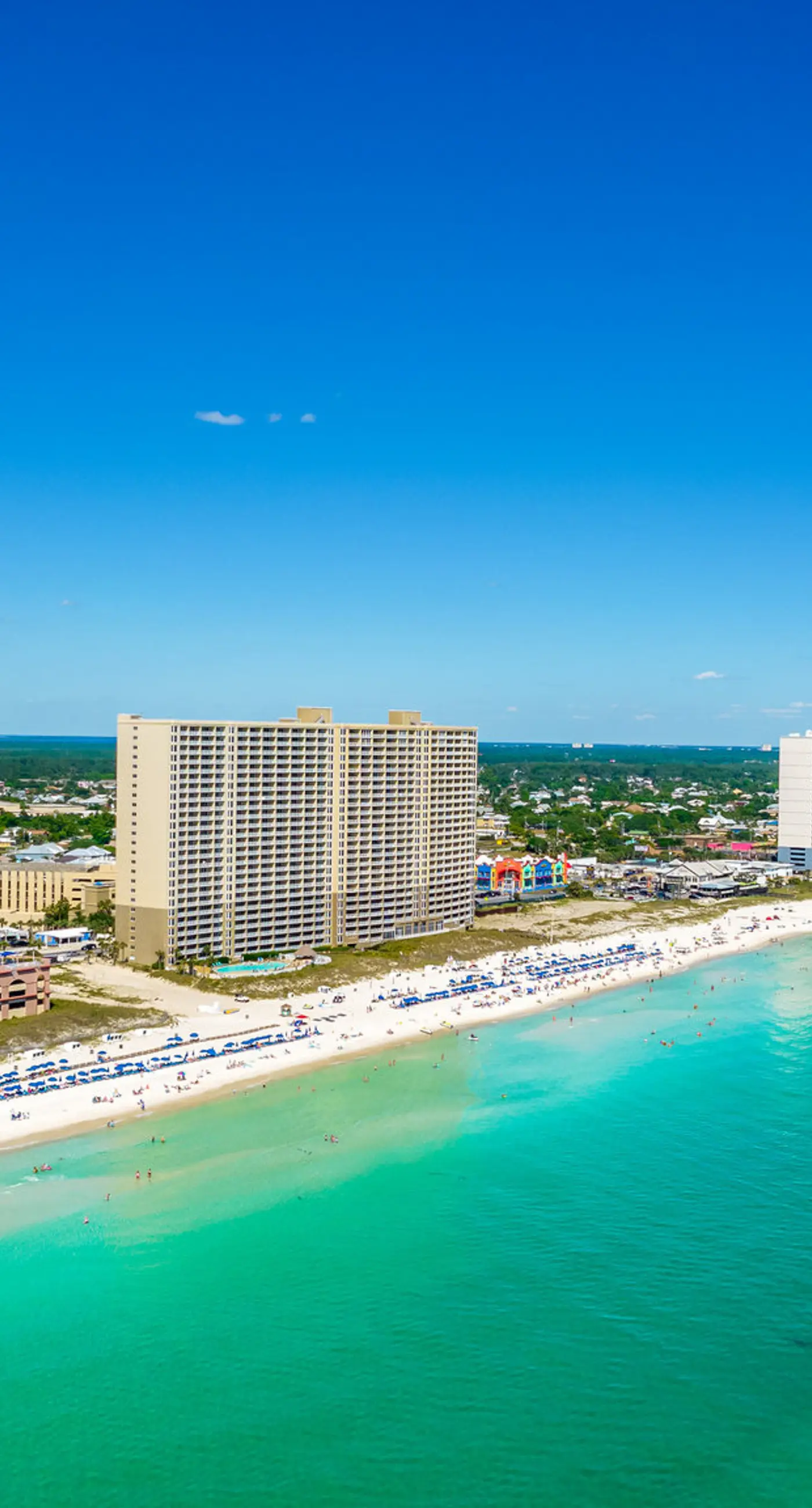 14th-floor, waterfront, beach-chic condo with pools & gym