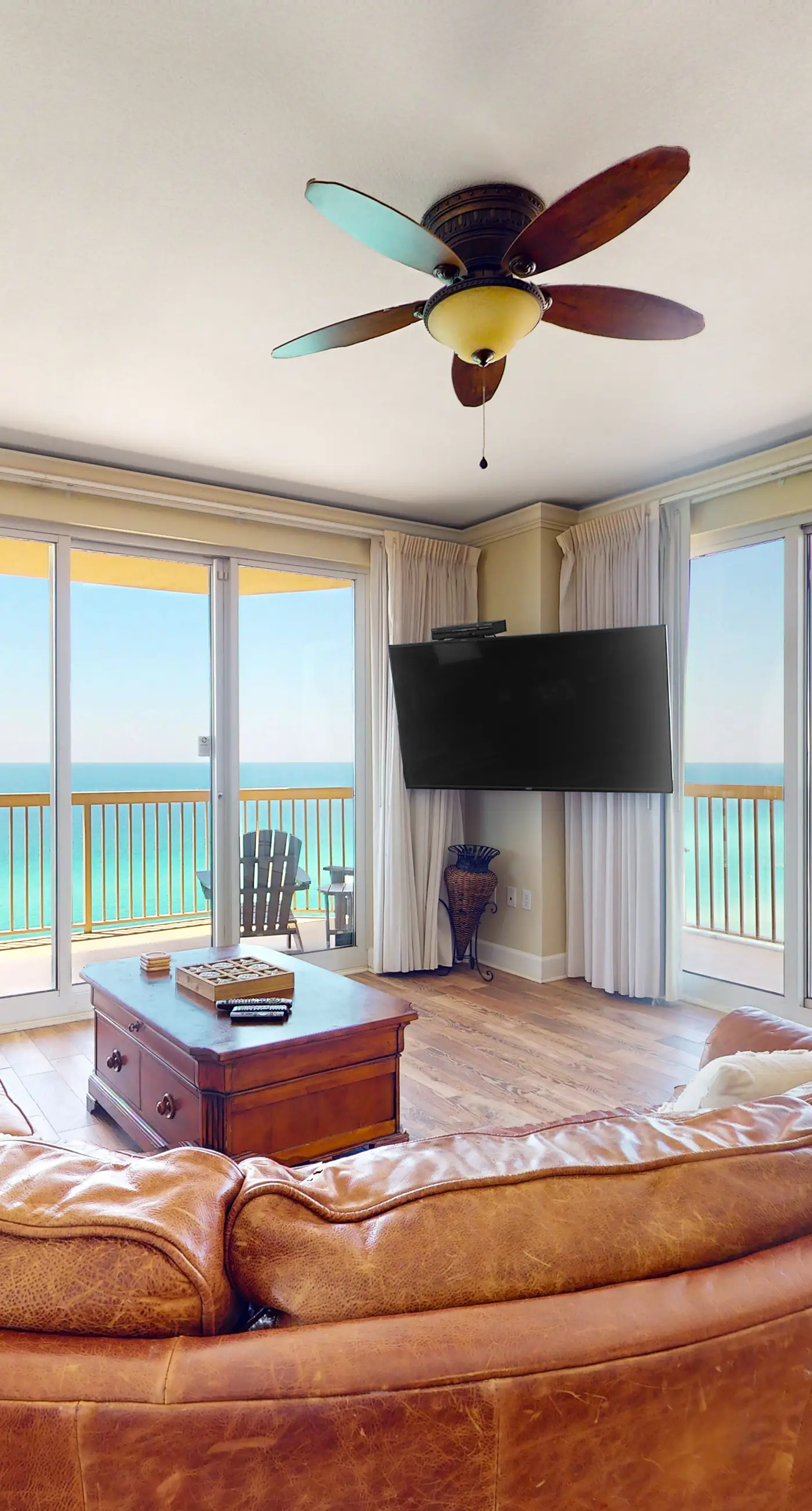 Tropical-themed 17th-floor condo with beachfront views, pools & gym