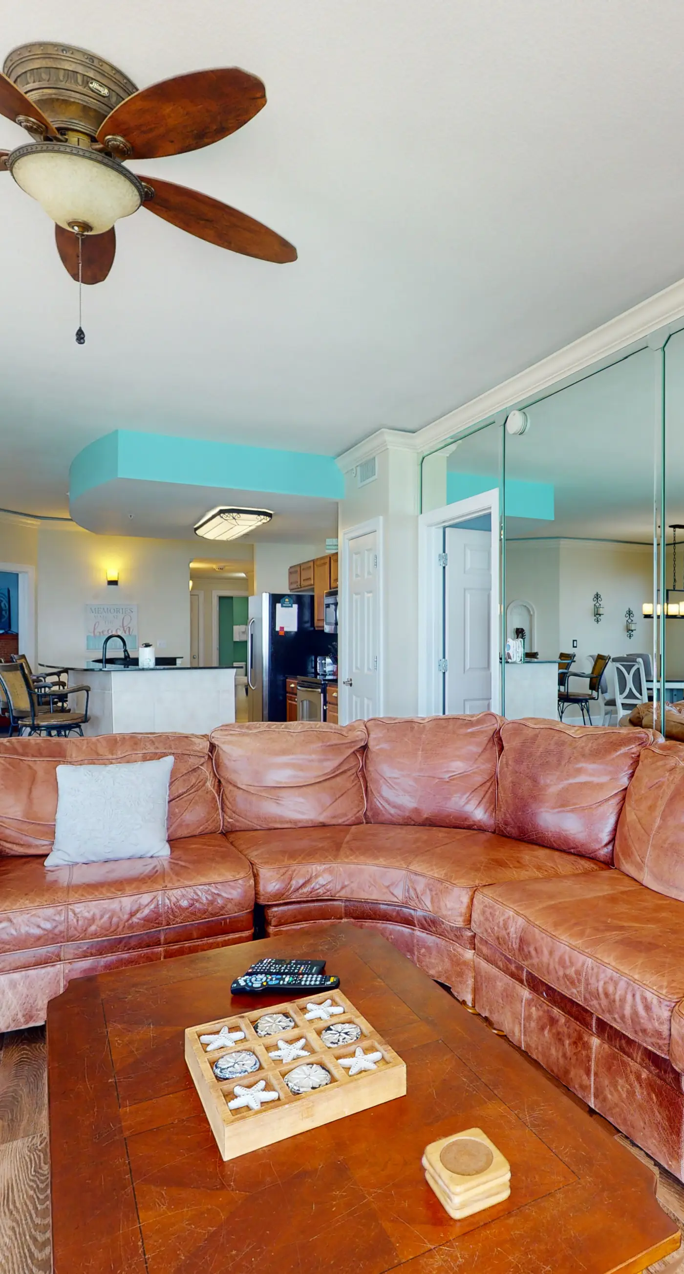 Tropical-themed 17th-floor condo with beachfront views, pools & gym