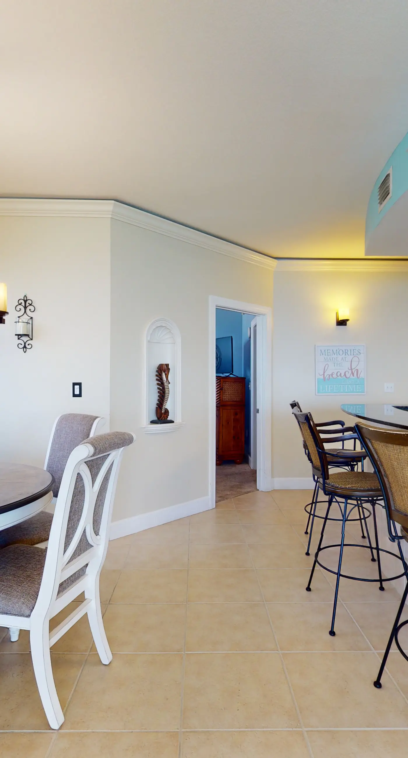 Tropical-themed 17th-floor condo with beachfront views, pools & gym