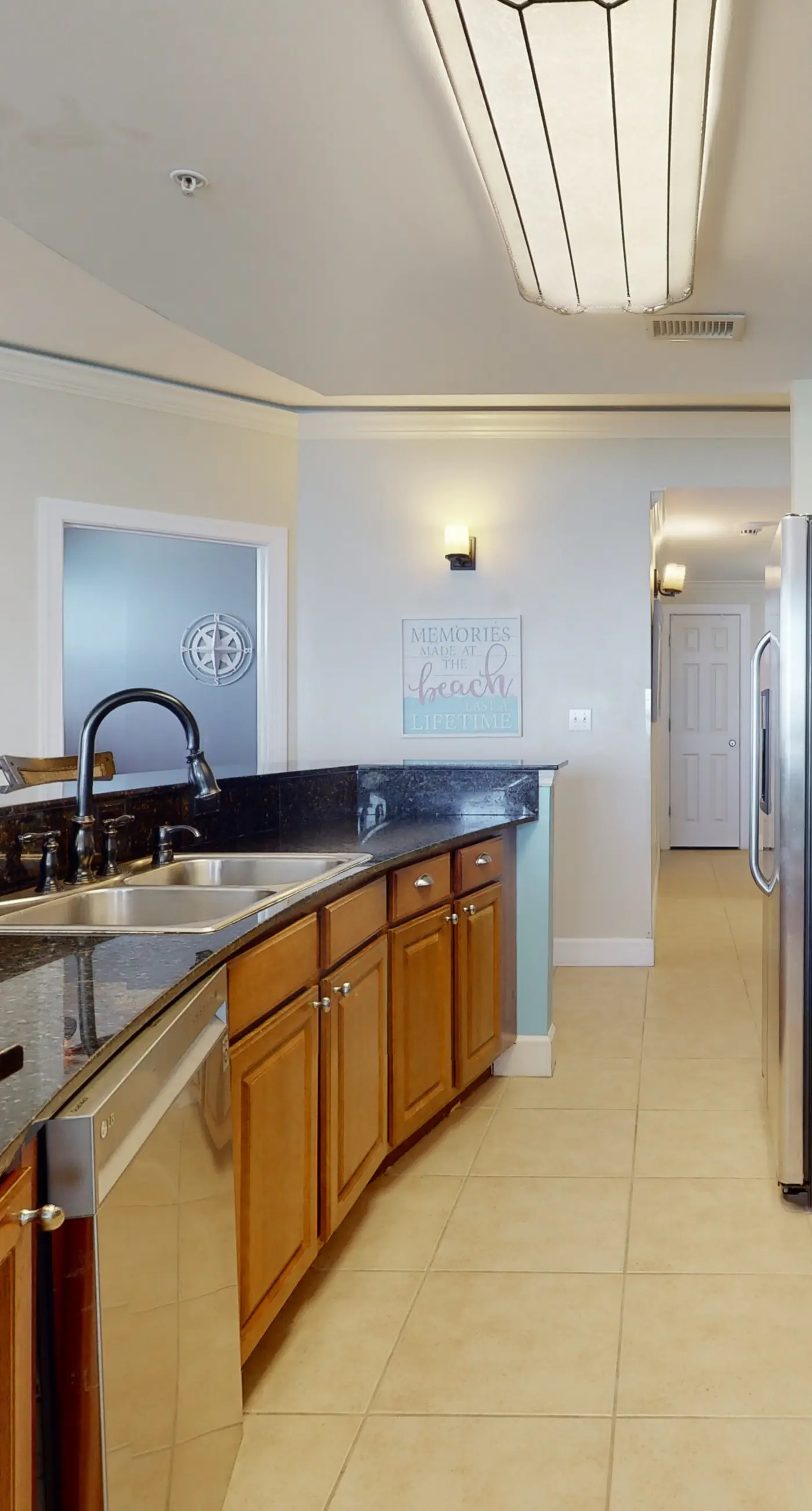 Tropical-themed 17th-floor condo with beachfront views, pools & gym
