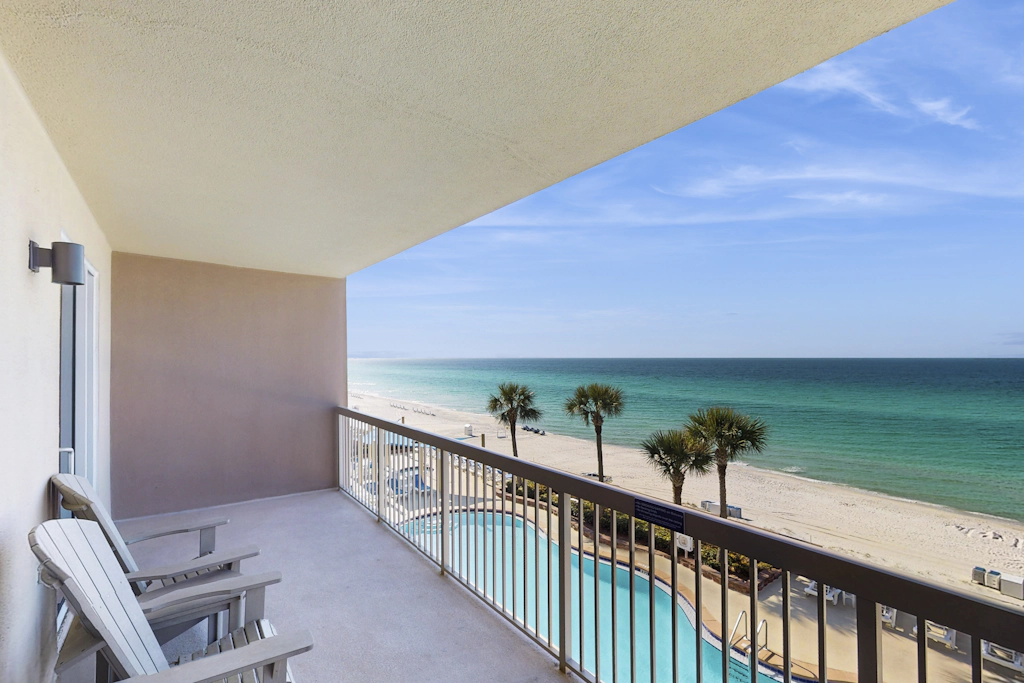 Water-view beachfront condo with pool - steps to the beach