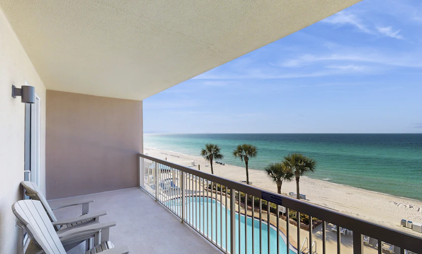 Water-view beachfront condo with pool - steps to the beach