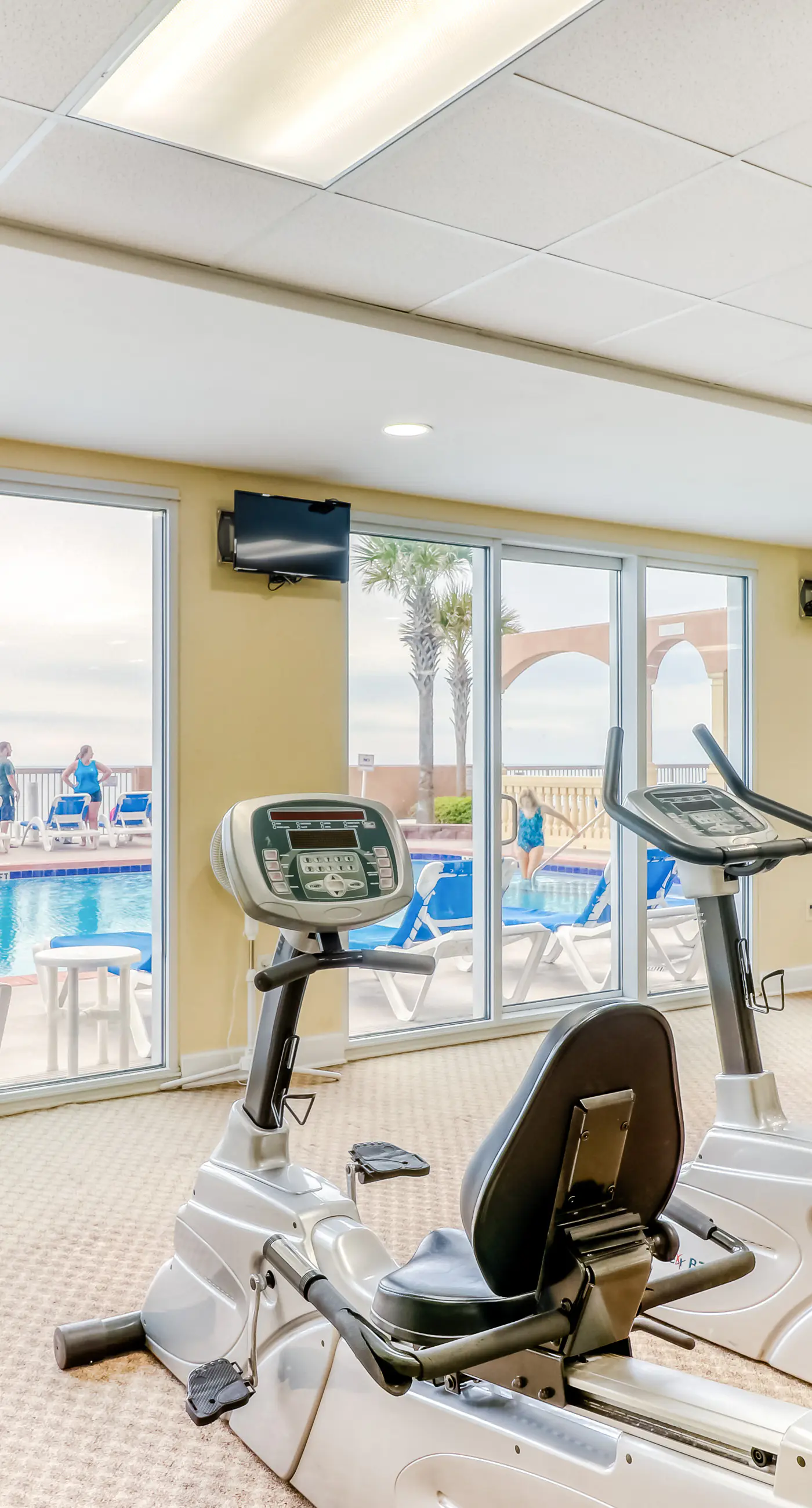 Elegant, beachfront condo with a furnished balcony, views & two pools