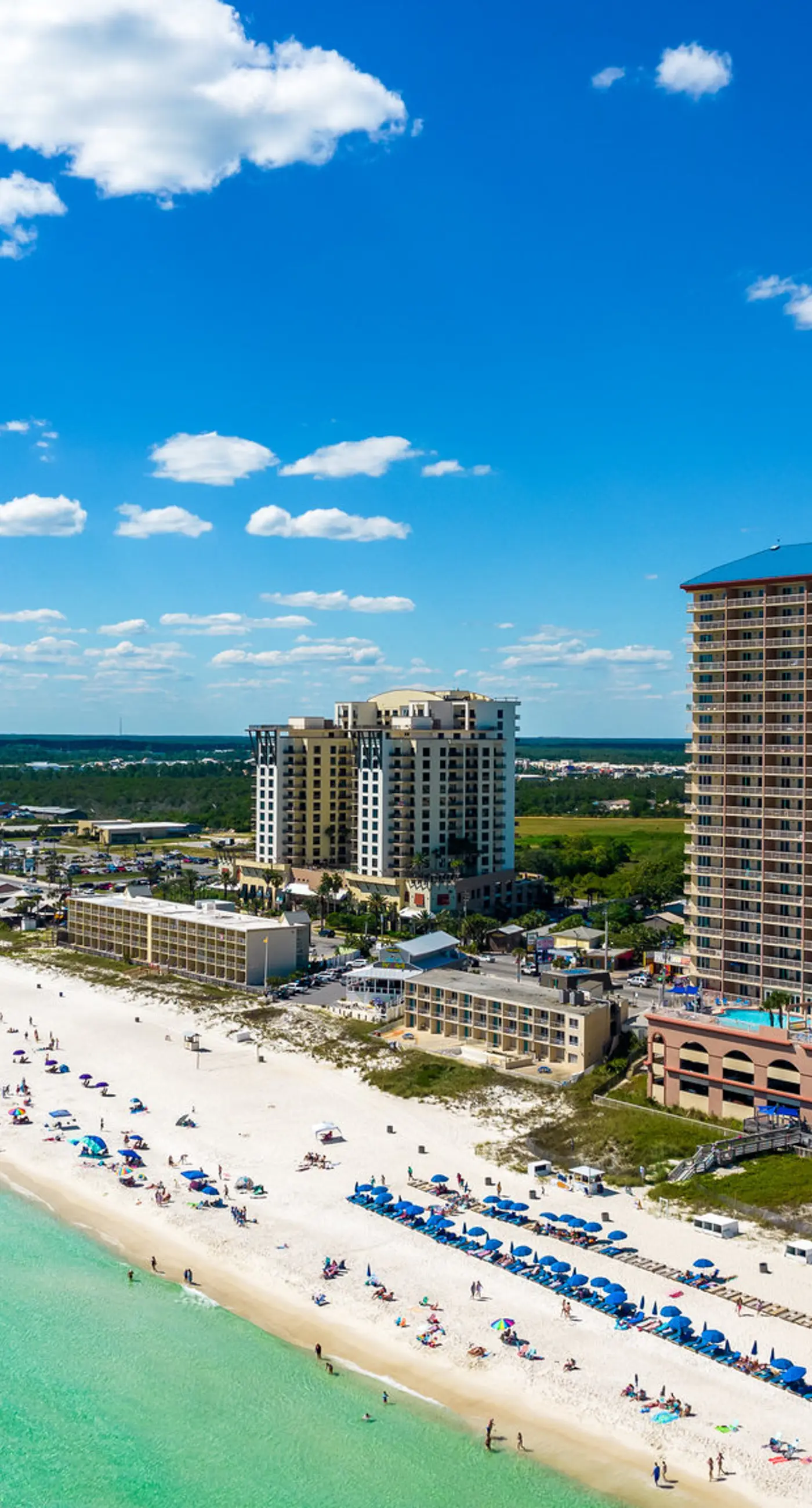 Elegant, beachfront condo with a furnished balcony, views & two pools