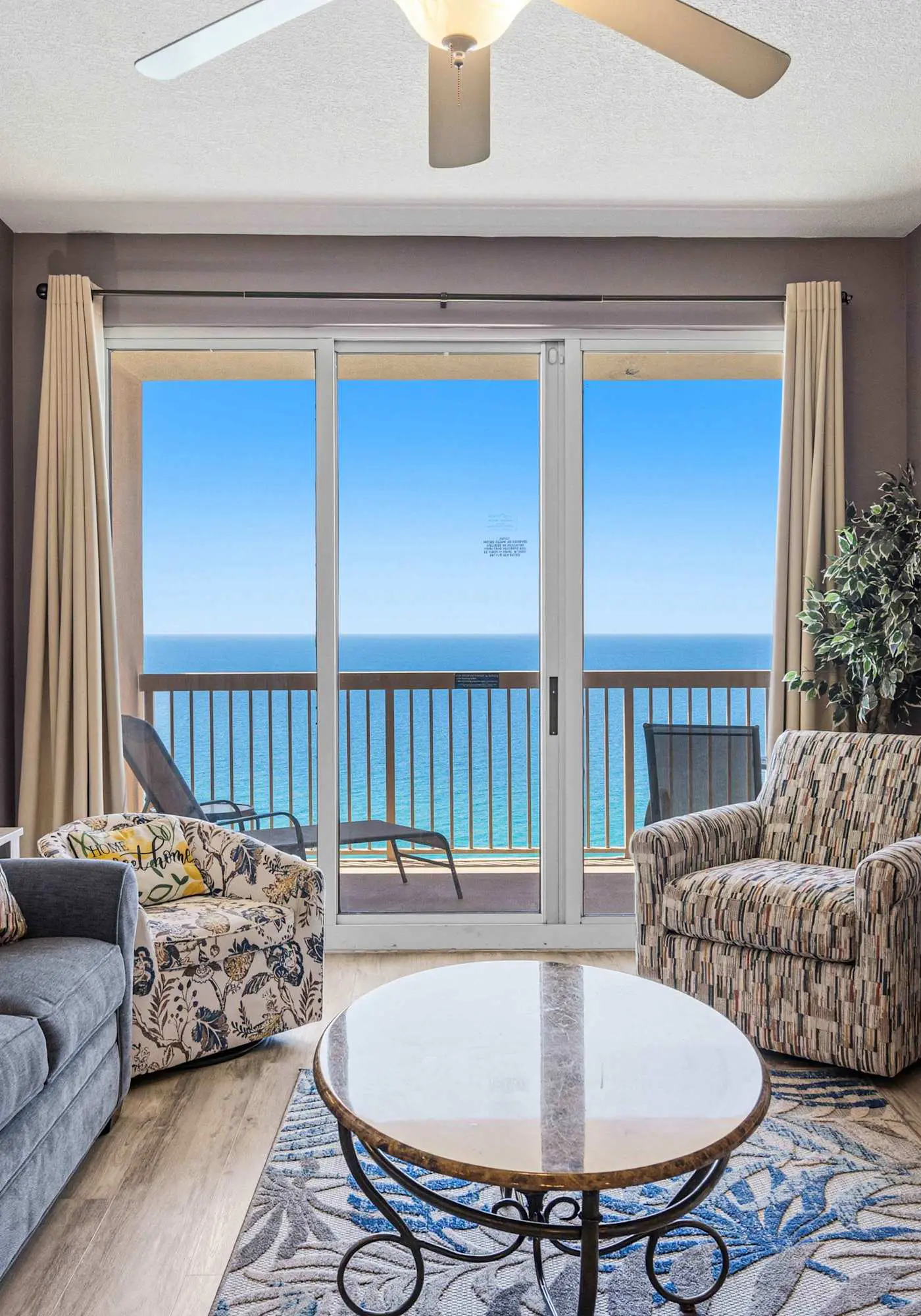 Elegant, beachfront condo with a furnished balcony, views & two pools