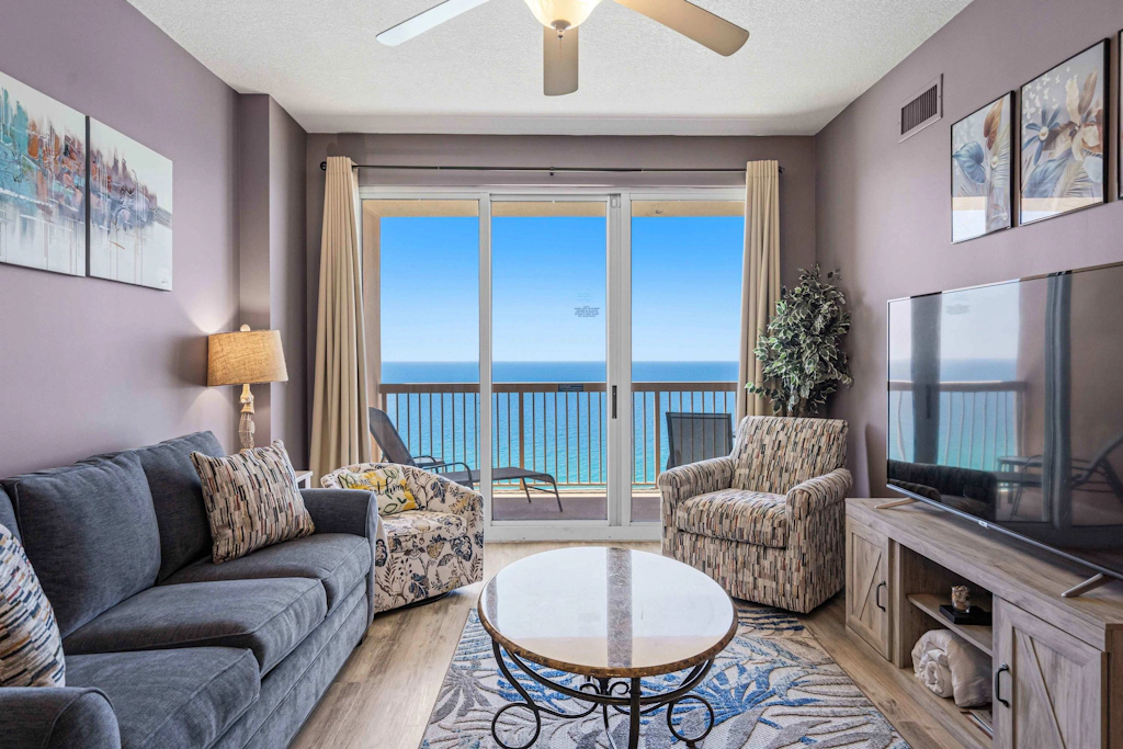 Elegant, beachfront condo with a furnished balcony, views & two pools
