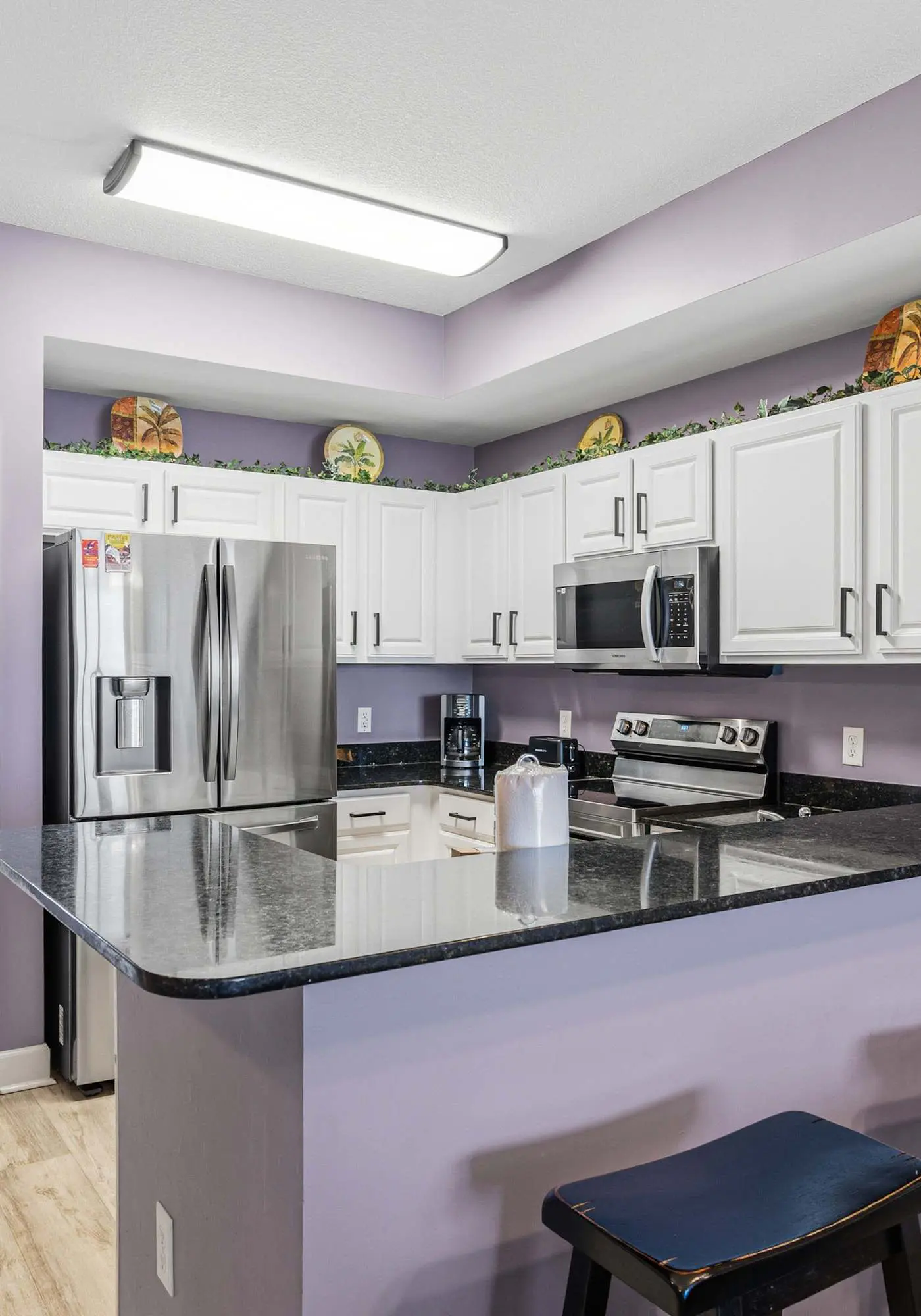 Elegant, beachfront condo with a furnished balcony, views & two pools
