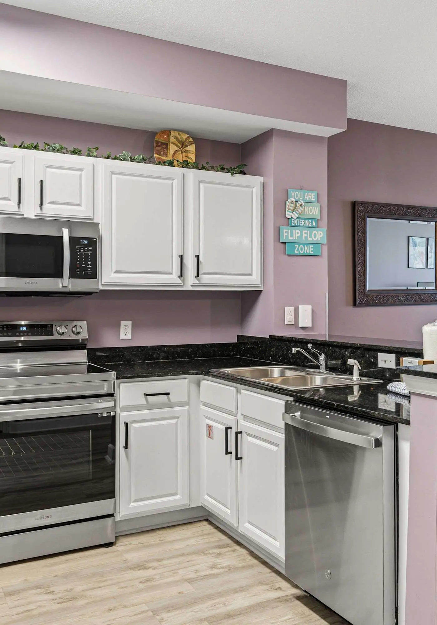 Elegant, beachfront condo with a furnished balcony, views & two pools