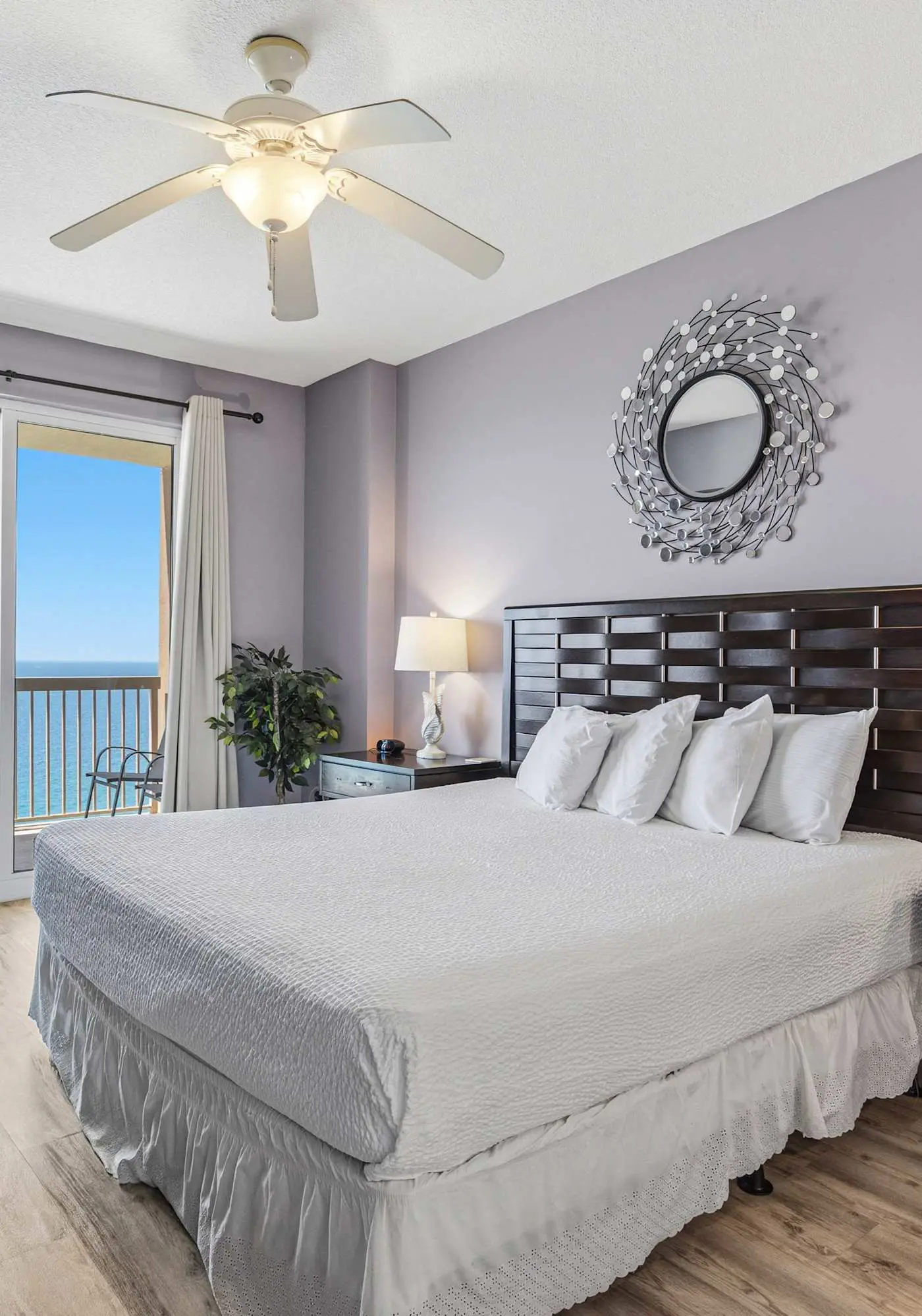 Elegant, beachfront condo with a furnished balcony, views & two pools