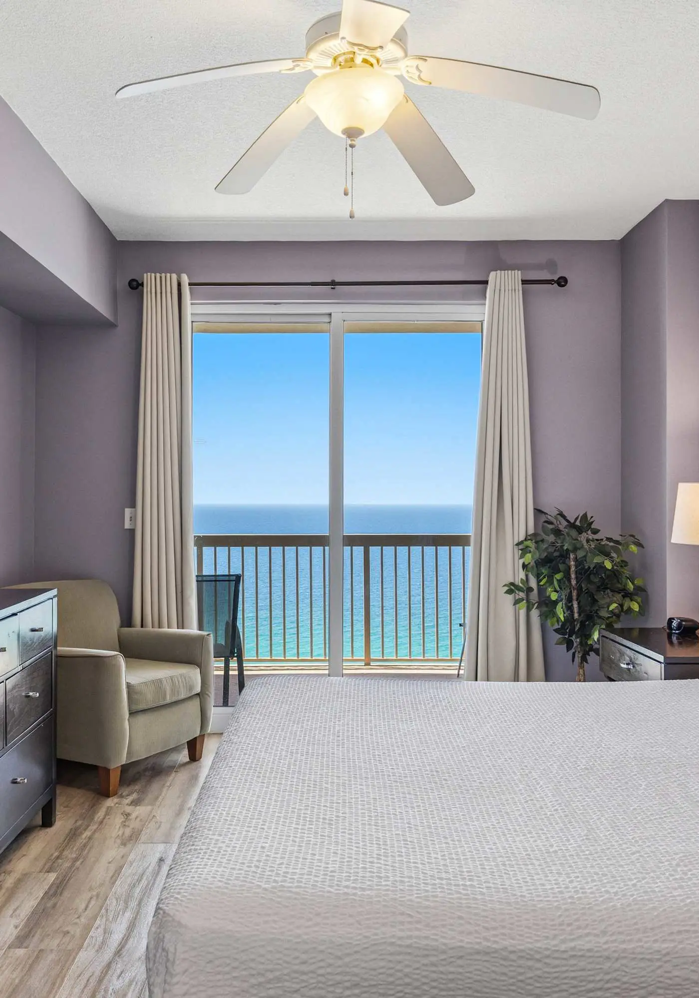 Elegant, beachfront condo with a furnished balcony, views & two pools