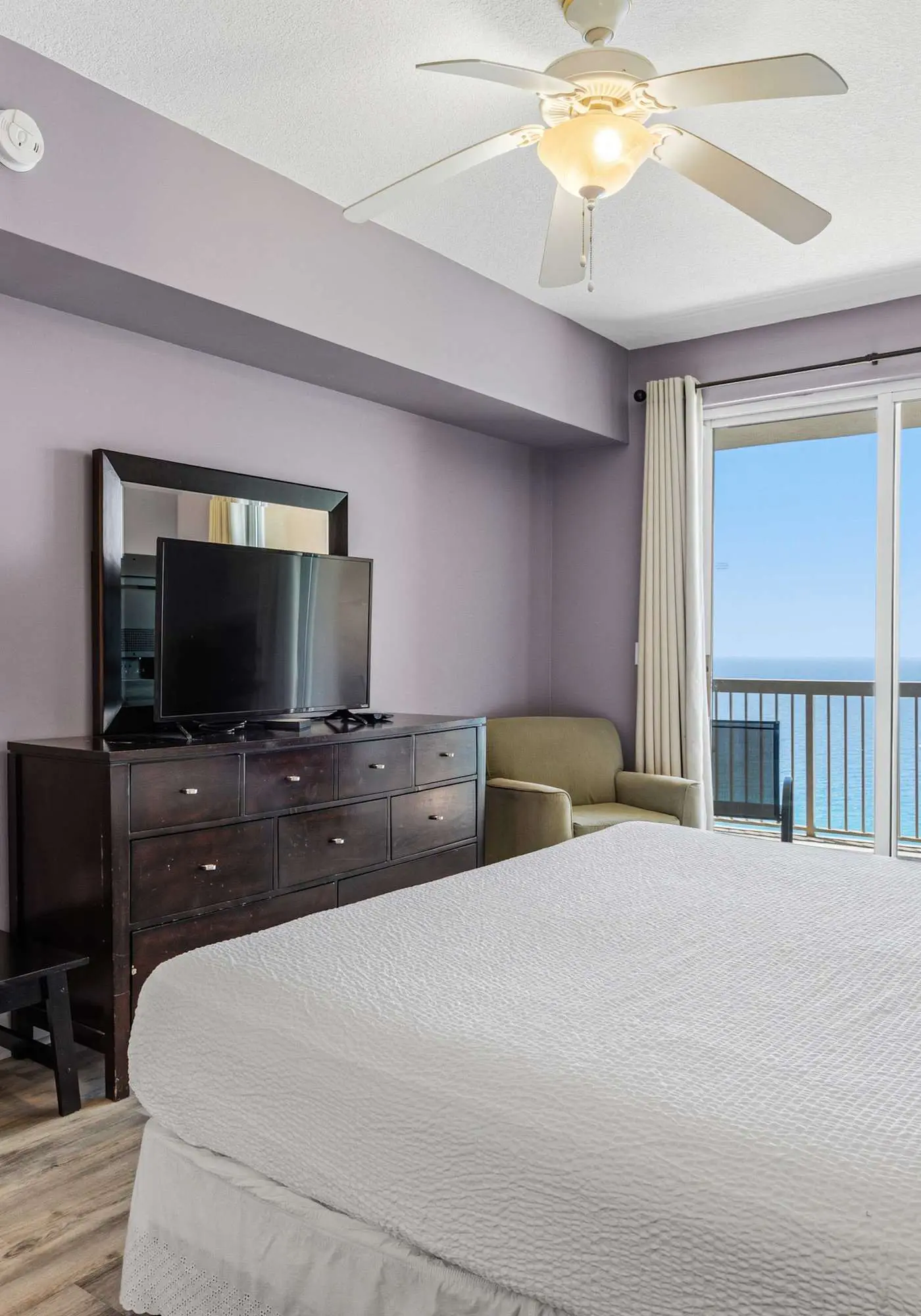 Elegant, beachfront condo with a furnished balcony, views & two pools