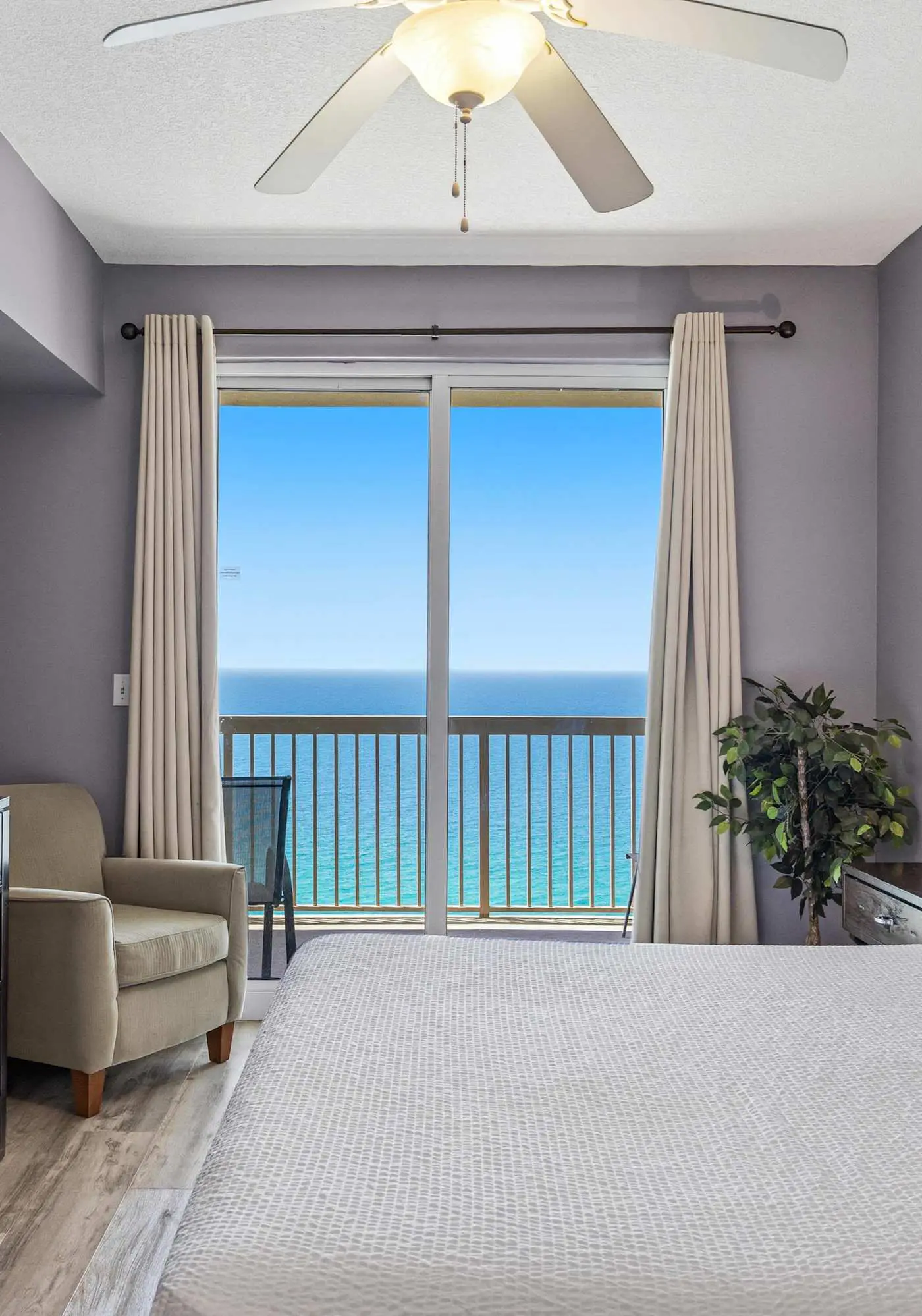 Elegant, beachfront condo with a furnished balcony, views & two pools