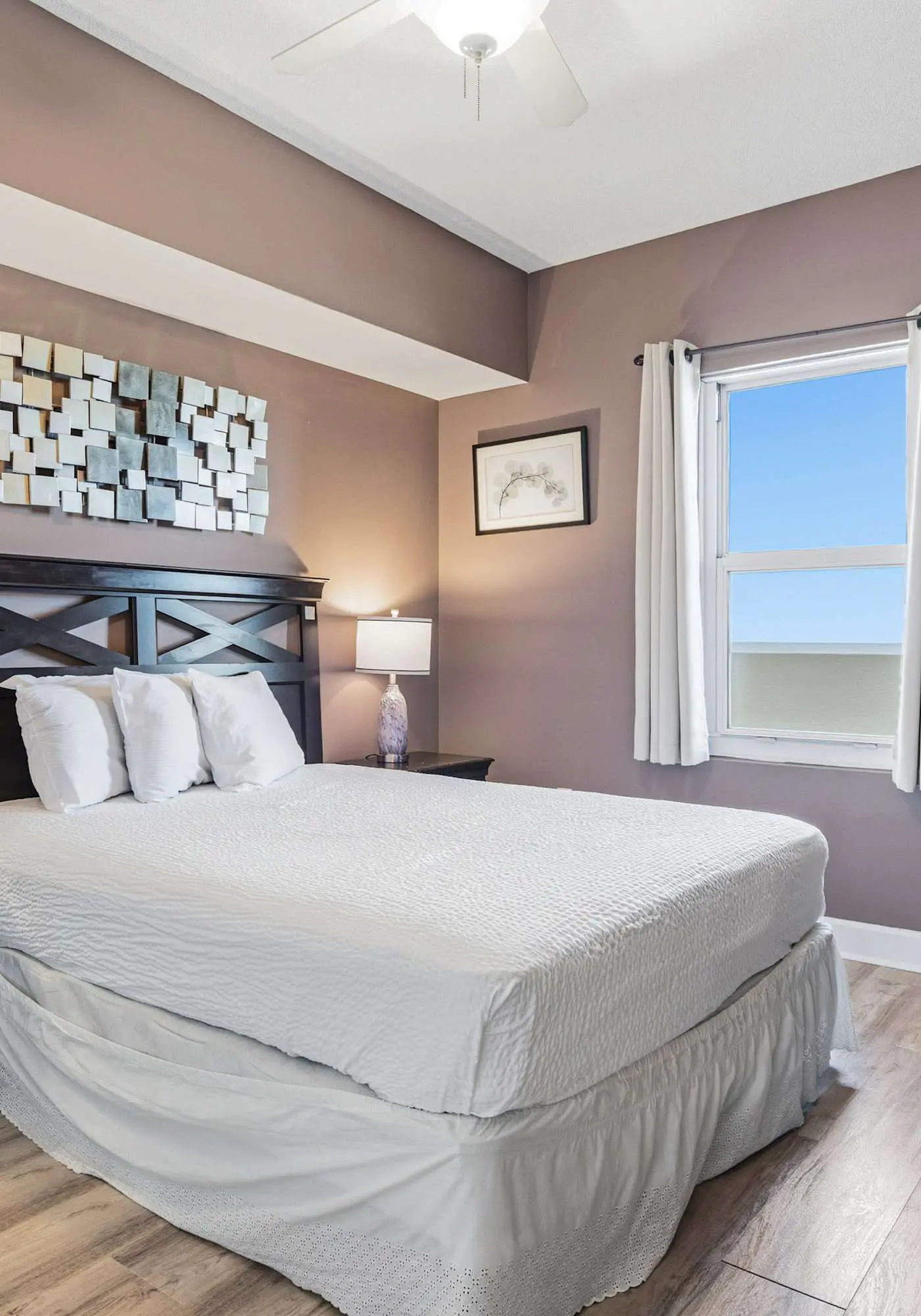 Elegant, beachfront condo with a furnished balcony, views & two pools