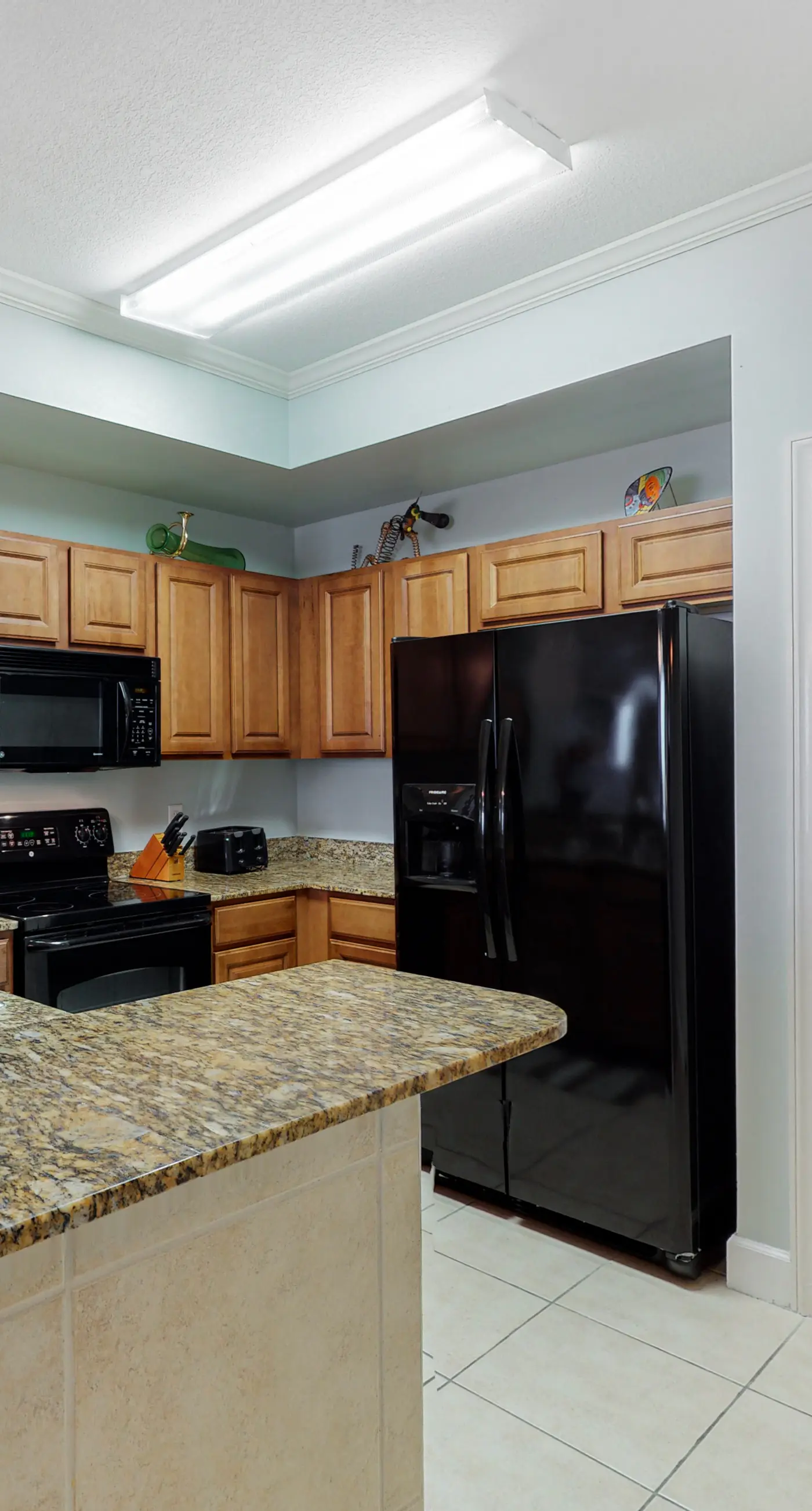 Elegant, beachfront condo with two pools, BBQ area & fitness room