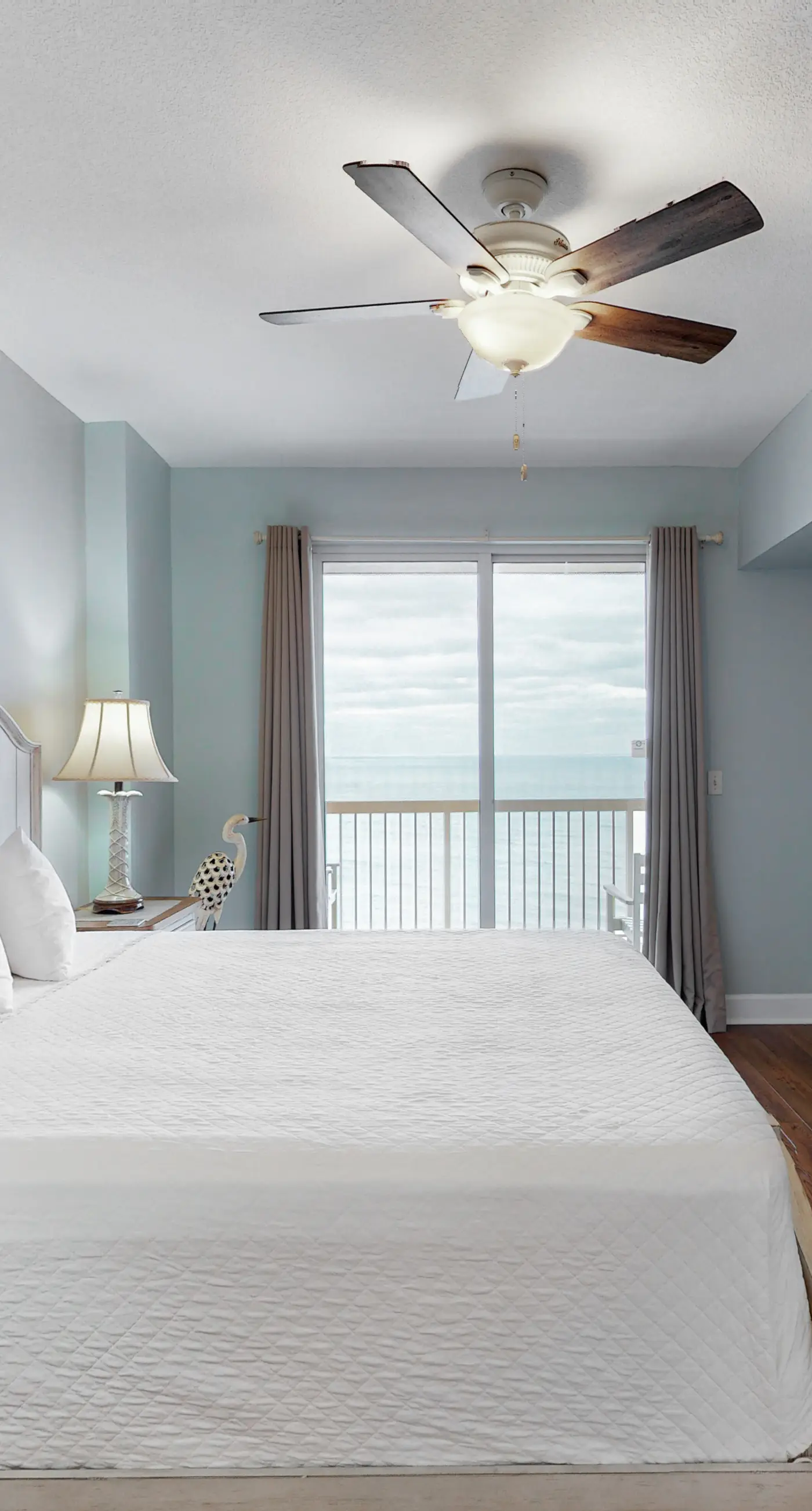Elegant, beachfront condo with two pools, BBQ area & fitness room